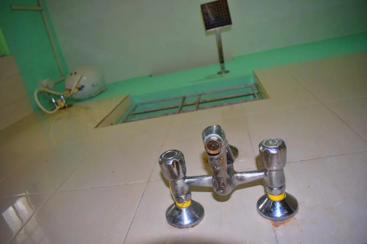 Shower in Nature Inn Cottages