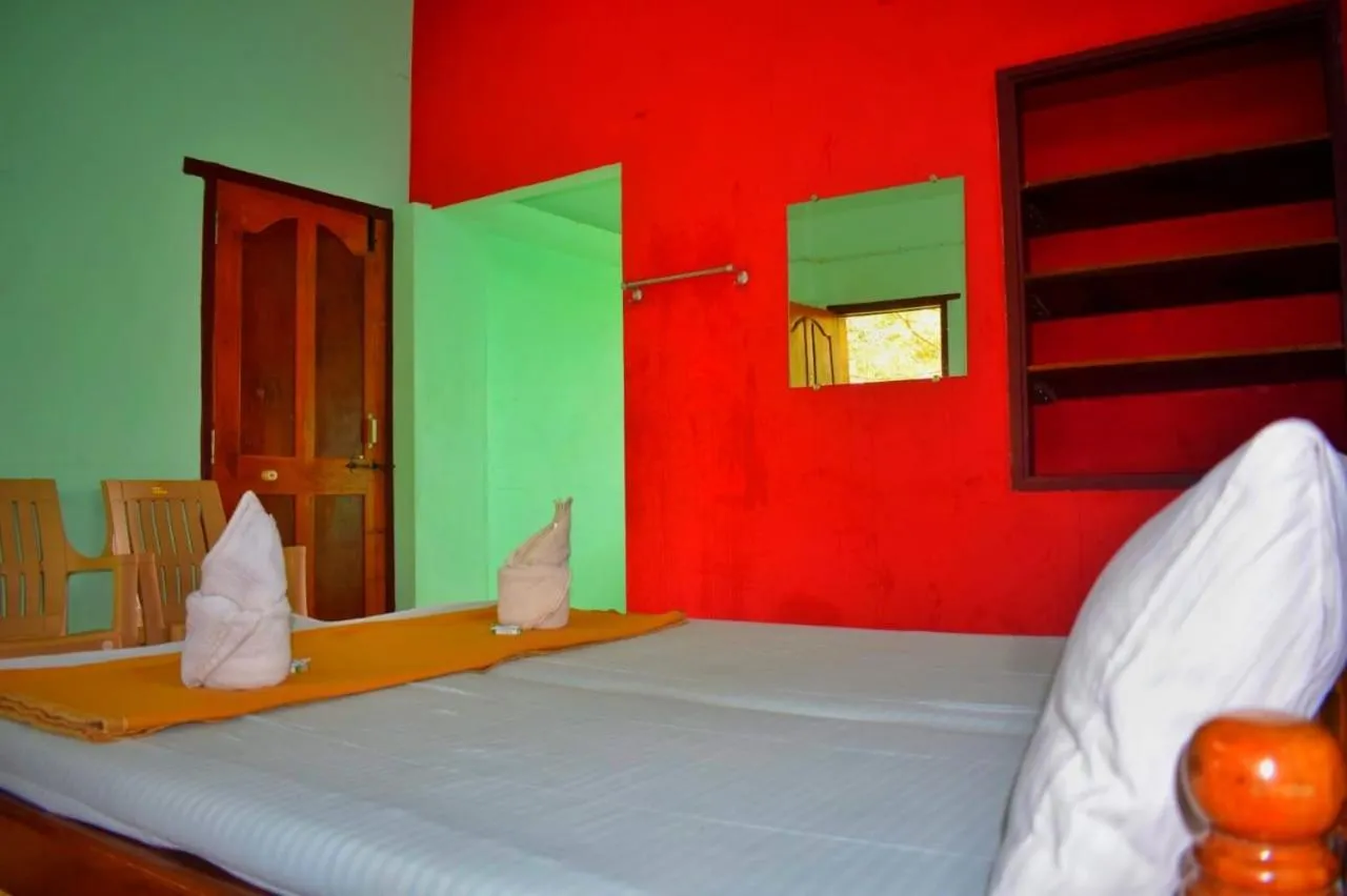 Photo of the whole room, Bed in Nature Inn Cottages