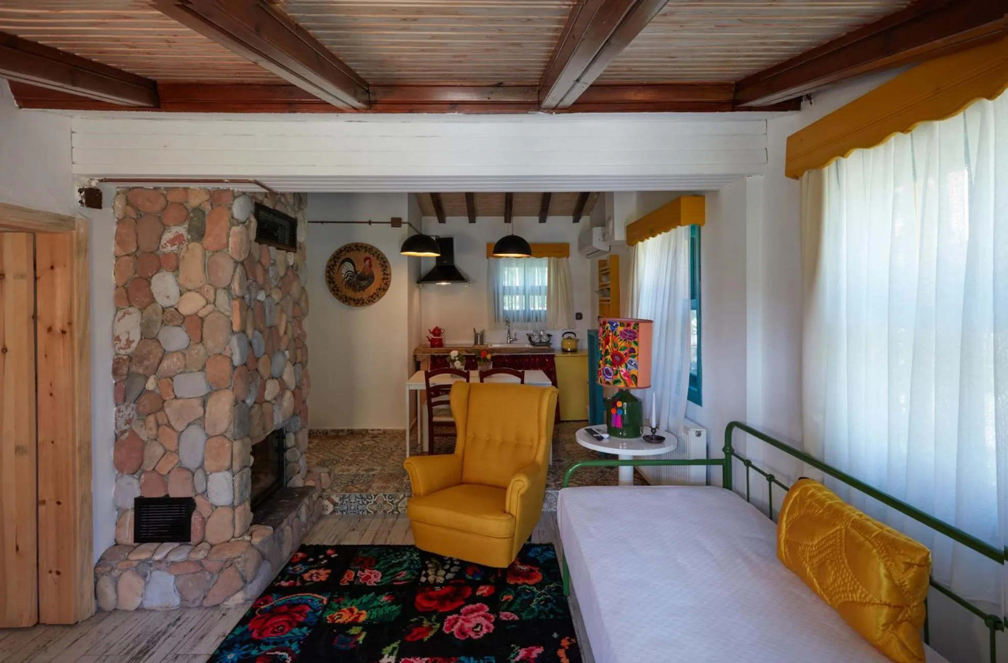 Seating area, Bed in Dachas Cove Hotel
