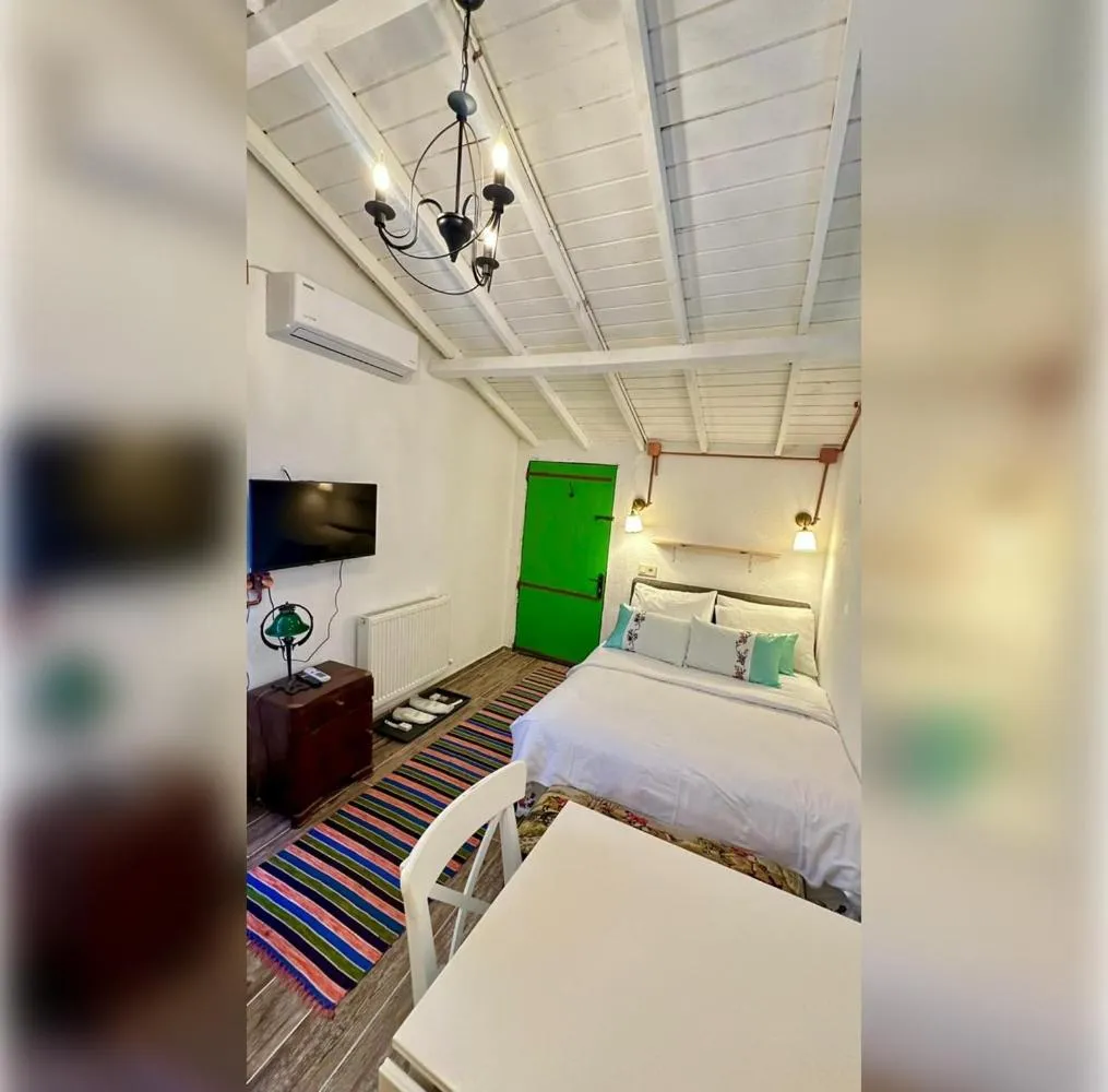 Bed in Dachas Cove Hotel