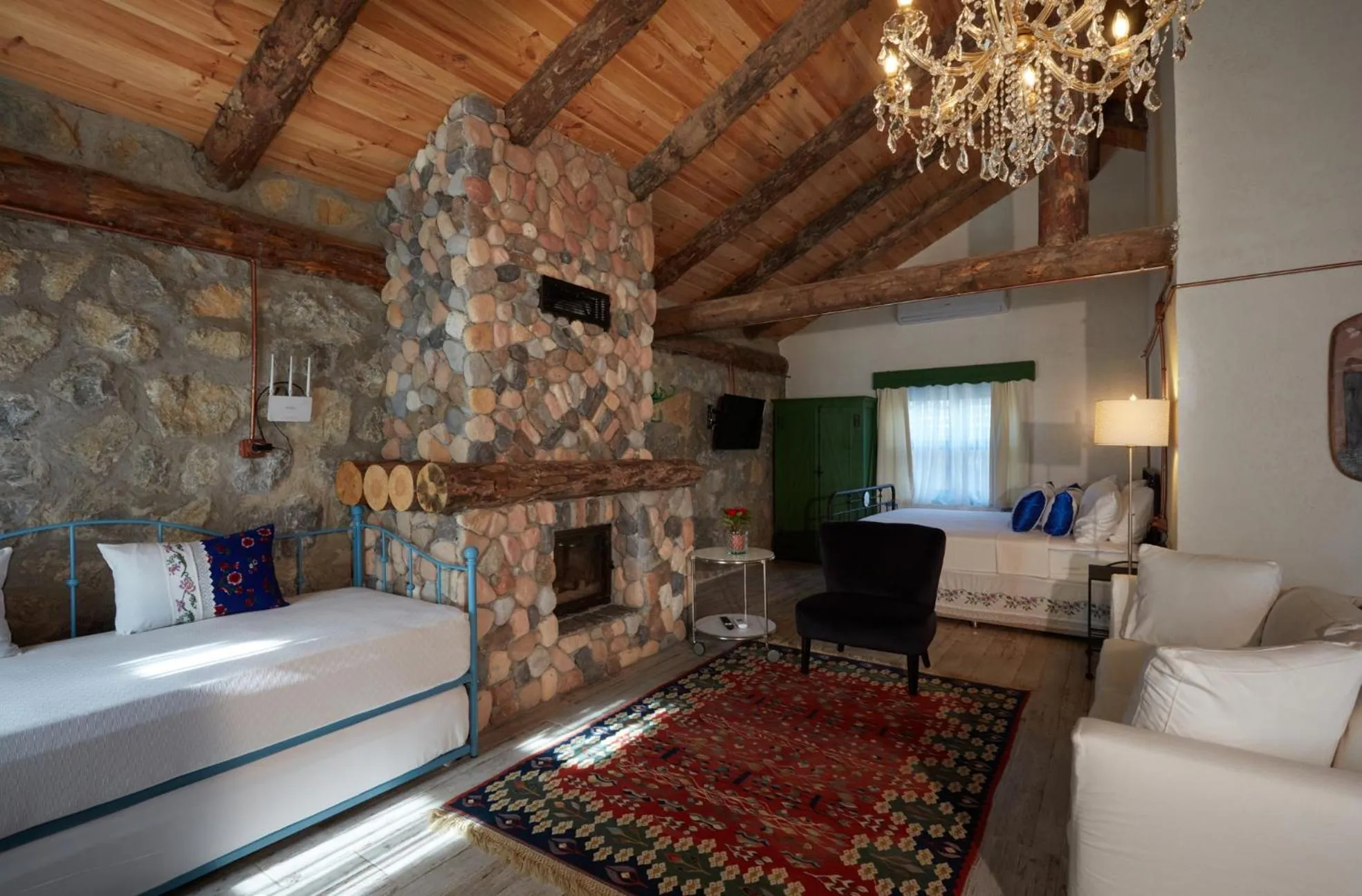 Communal lounge/ TV room, Bed in Dachas Cove Hotel