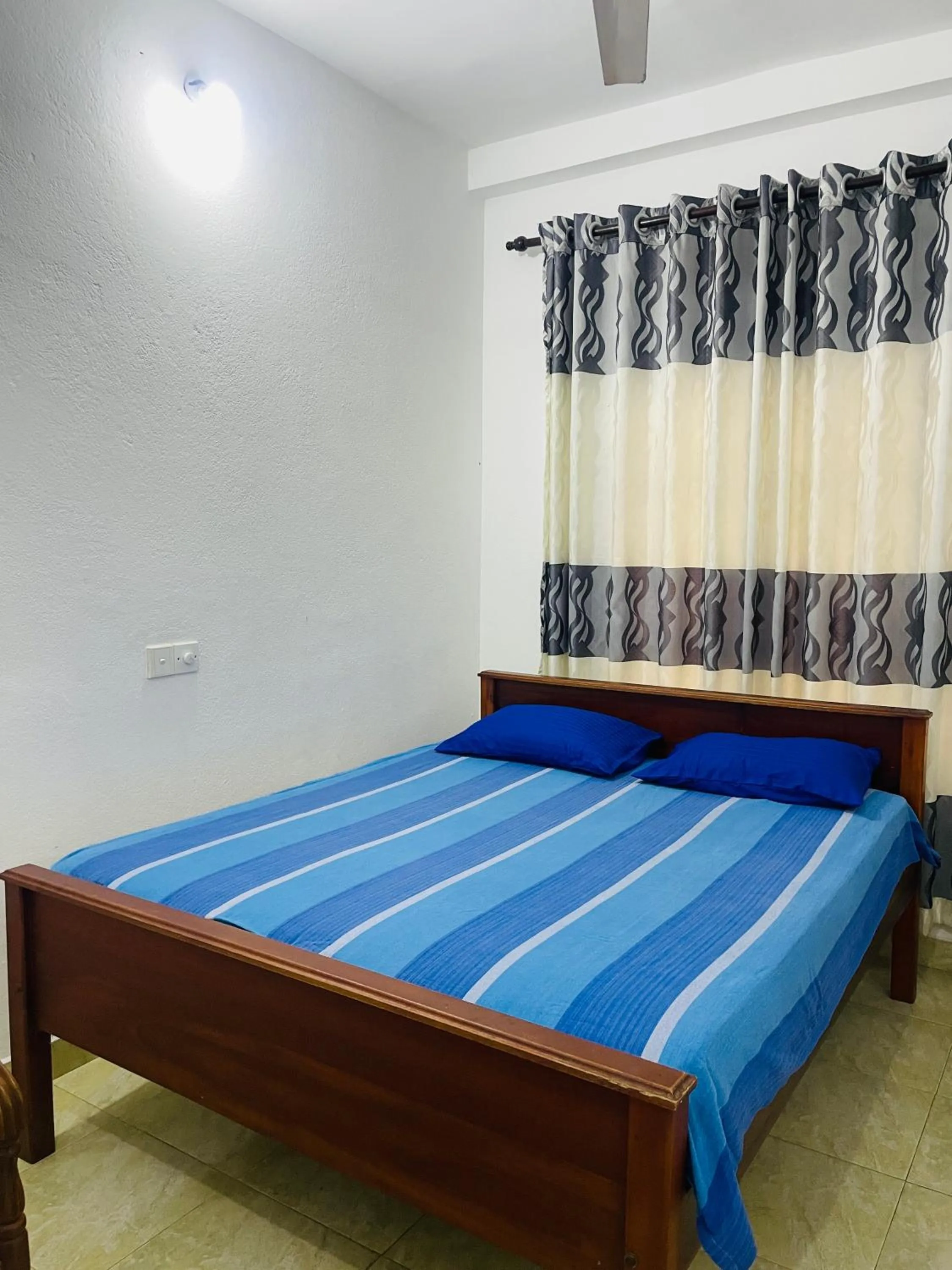 Photo of the whole room, Bed in White House Holiday Resort