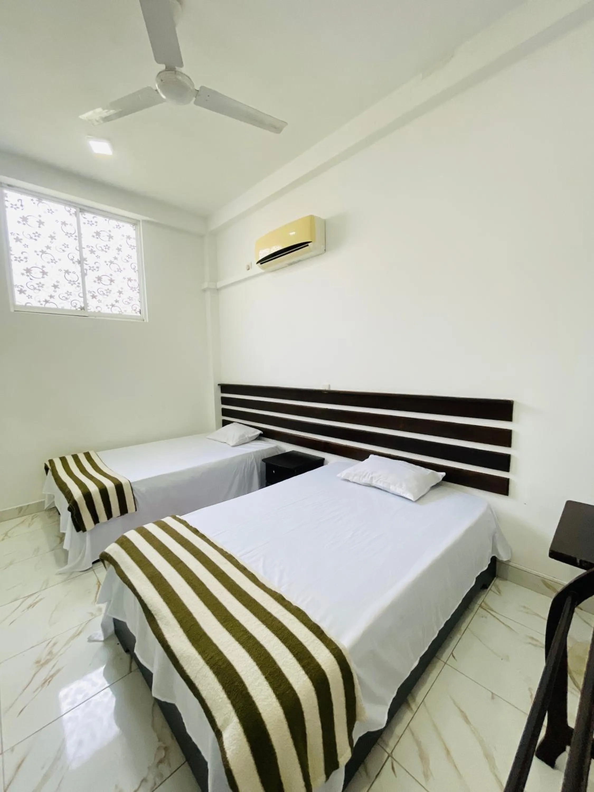 Photo of the whole room, Bed in White House Holiday Resort