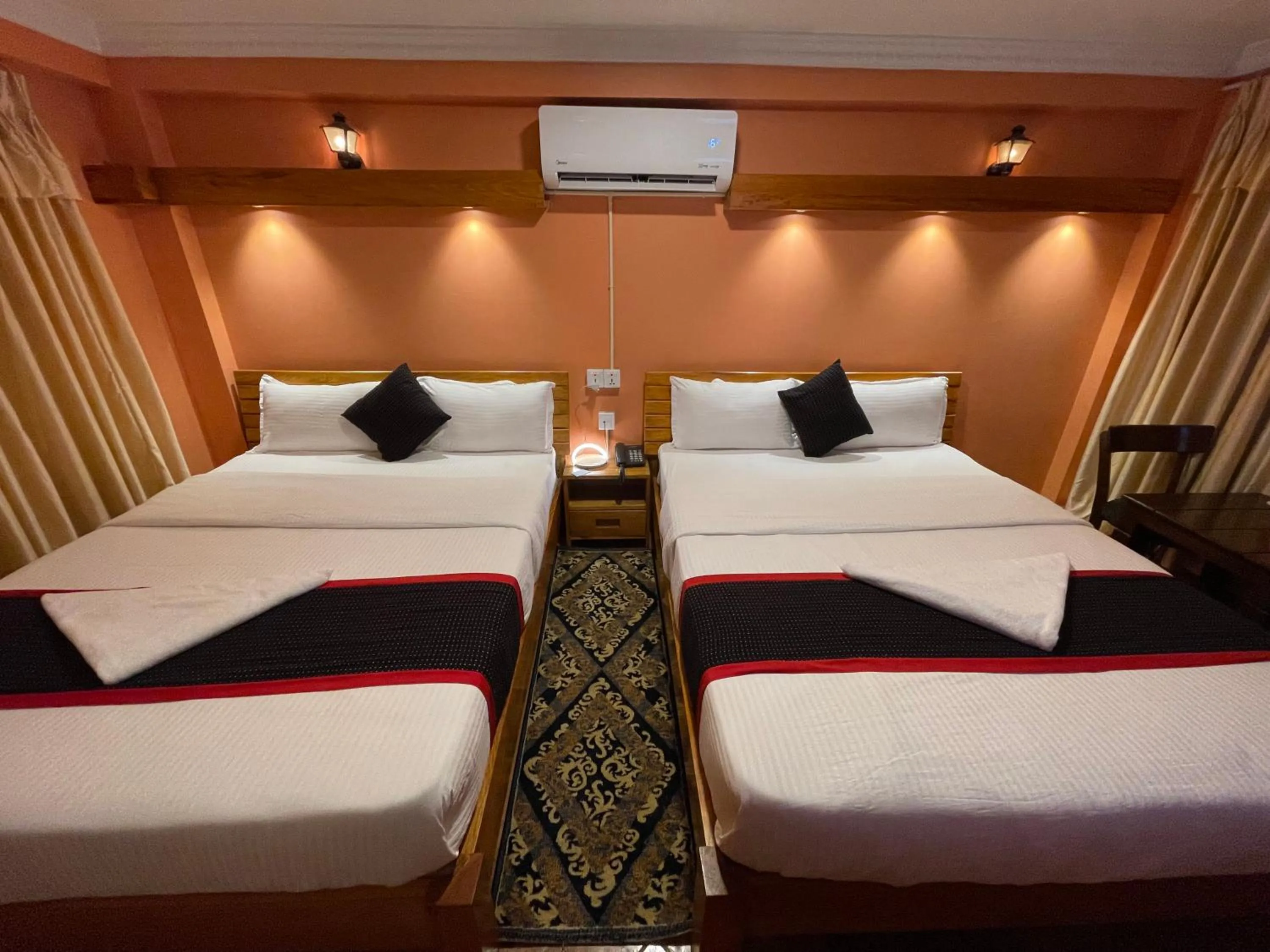 air conditioner, Bed in Hotel Empire & Rooftop Restaurant