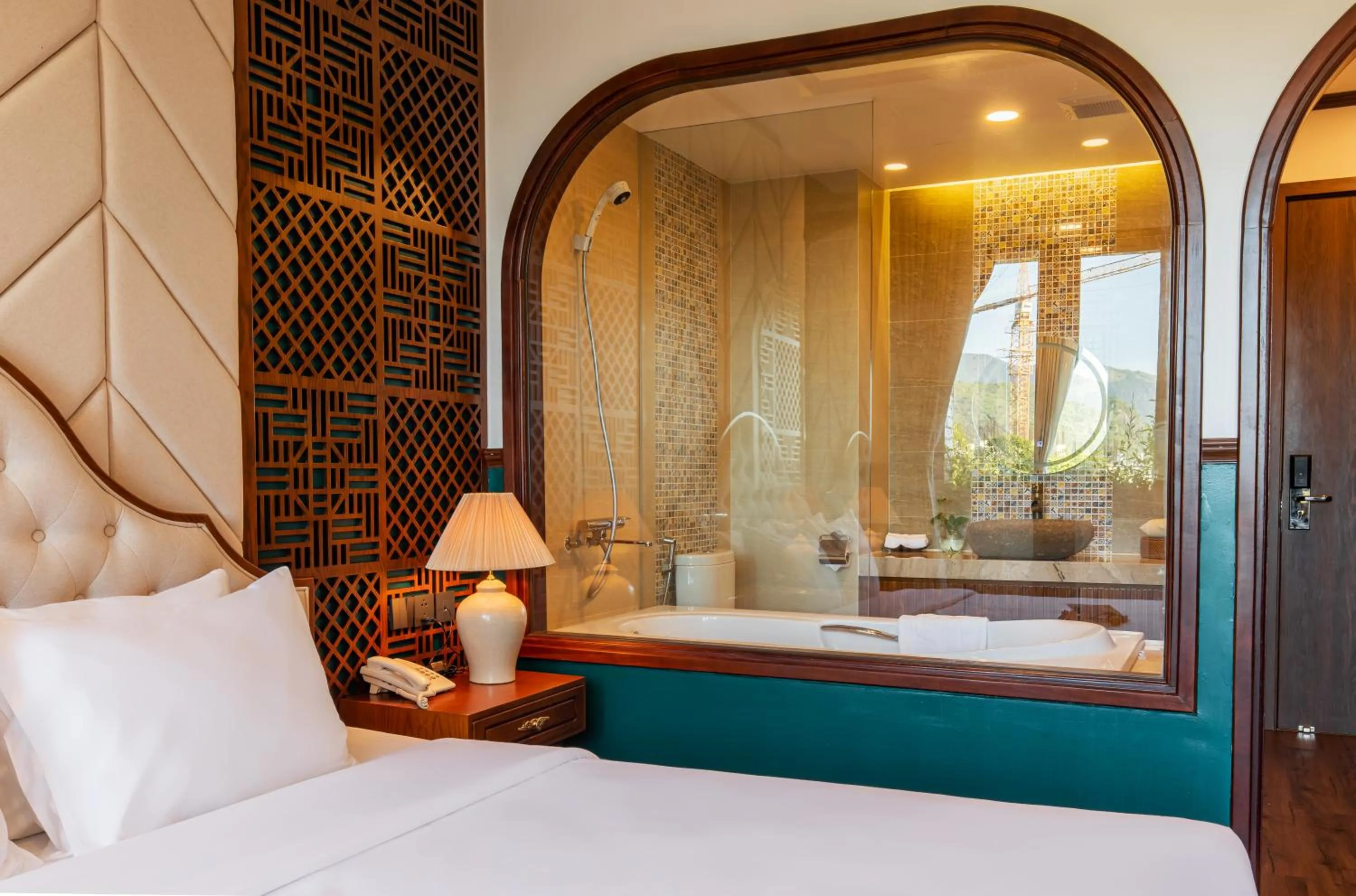 Shower, Bed in Boutik Cham NhaTrang Hotel