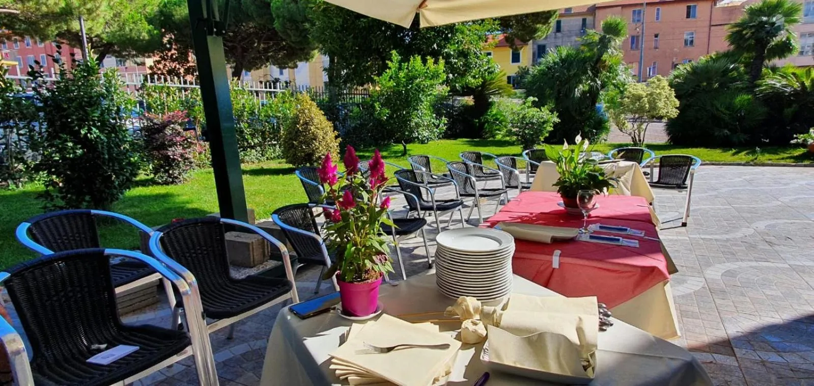 Garden in Hotel Sud Est by Fam Rossetti