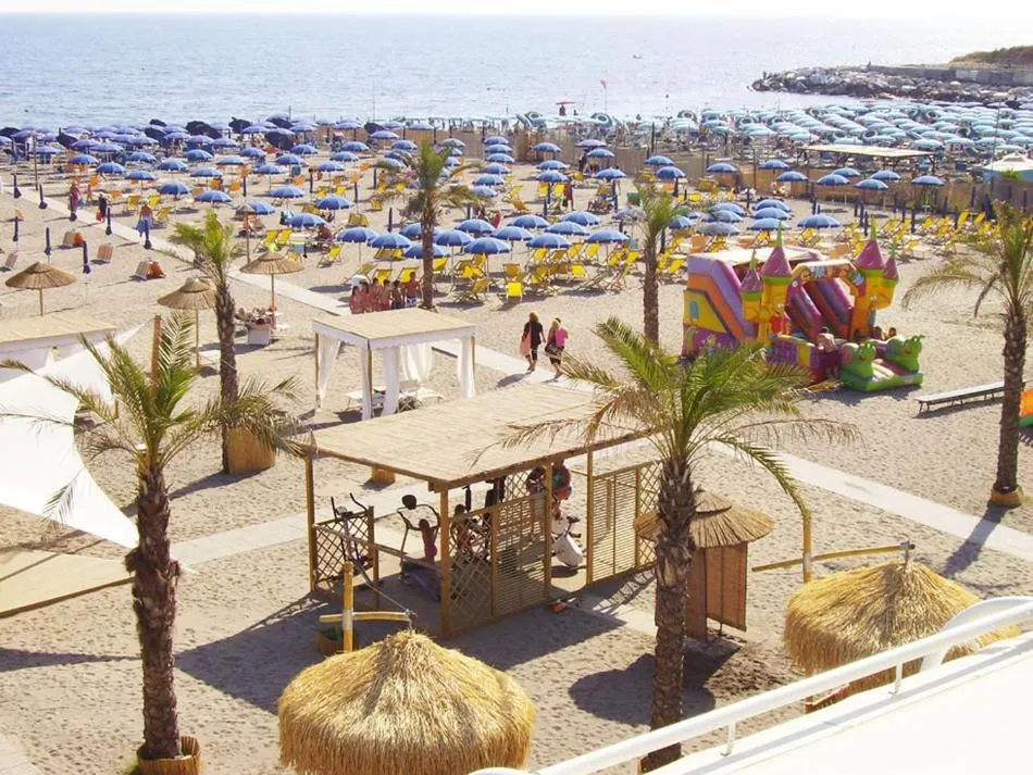 Beach in Hotel Sud Est by Fam Rossetti