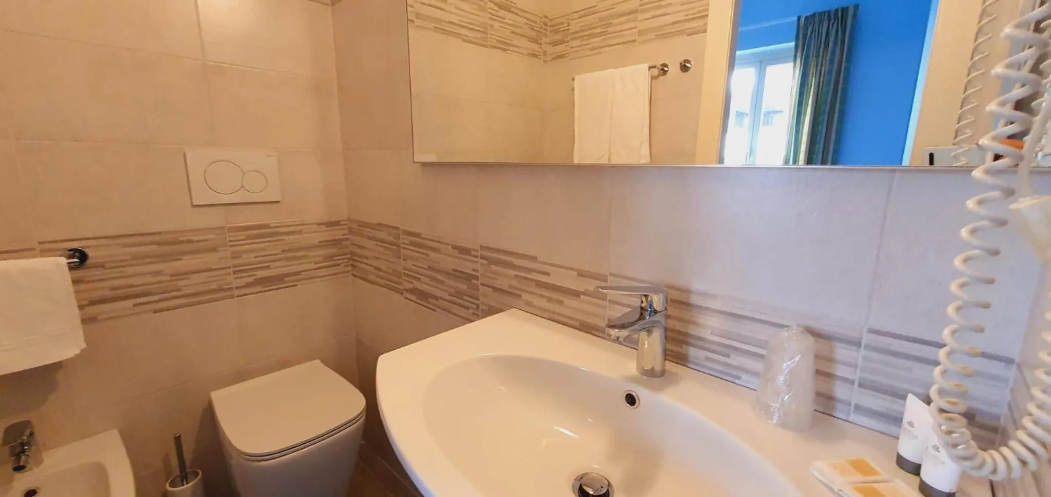 Bathroom in Hotel Sud Est by Fam Rossetti