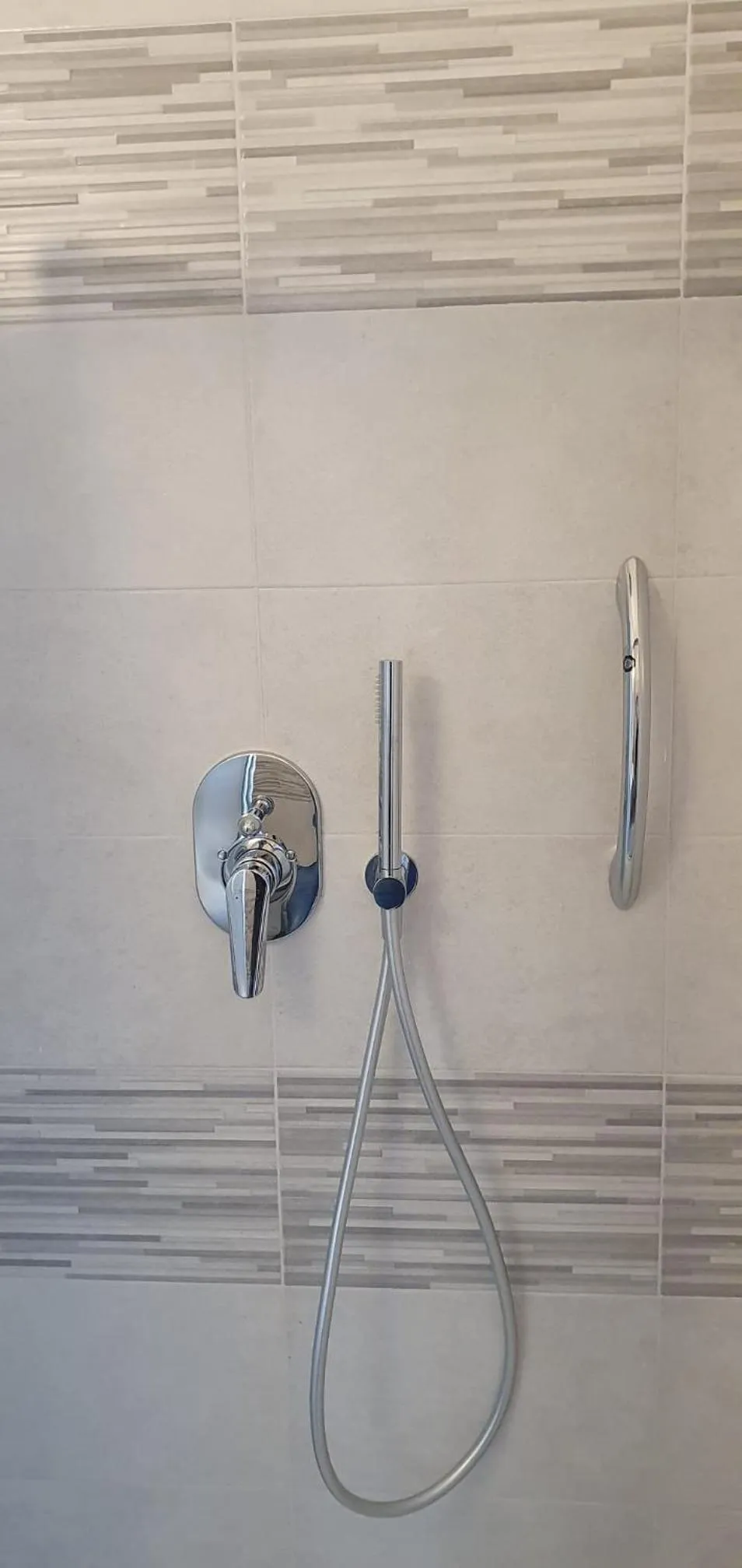 Shower in Hotel Sud Est by Fam Rossetti