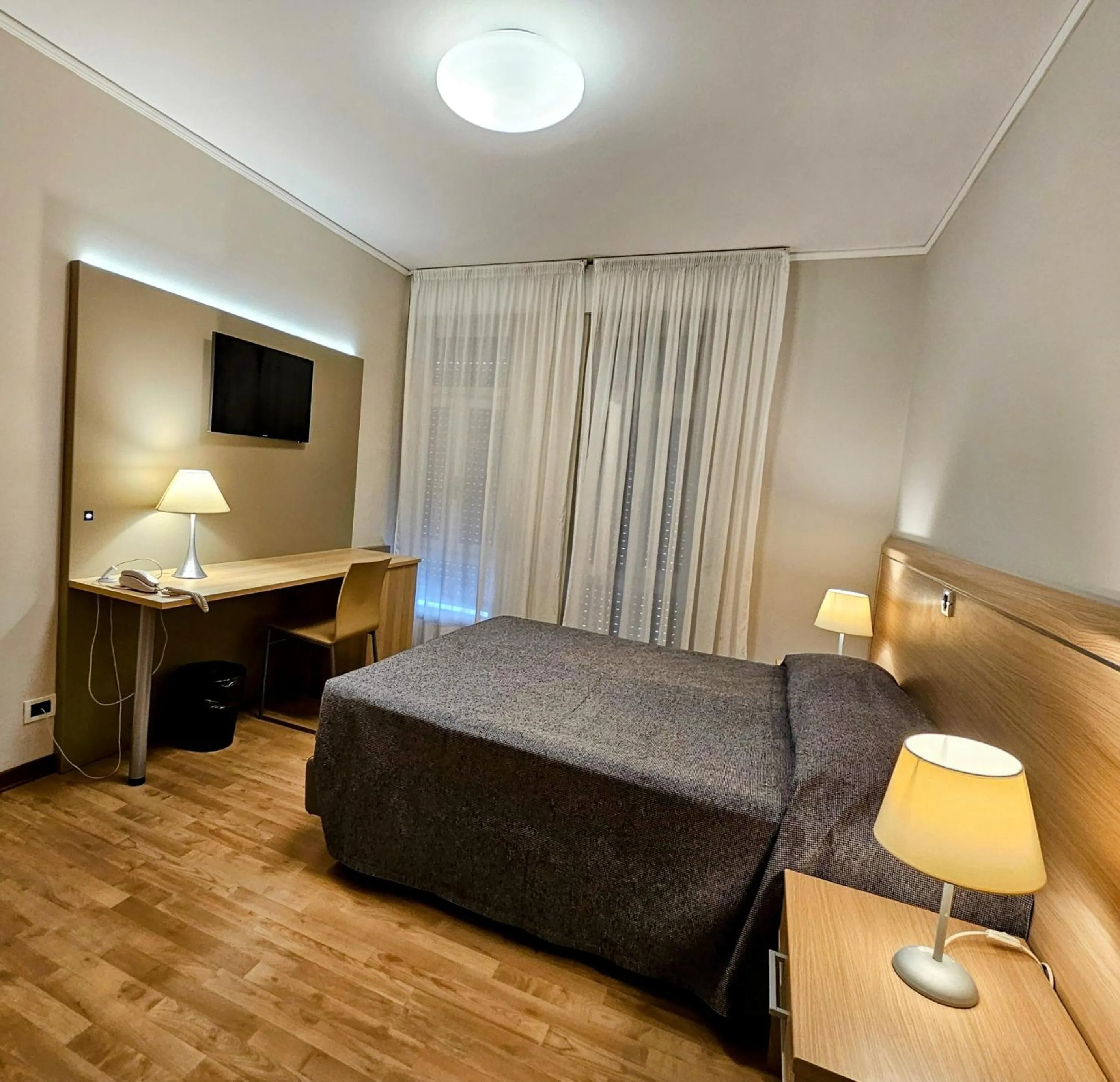 Bed in Hotel Eurovil Garni