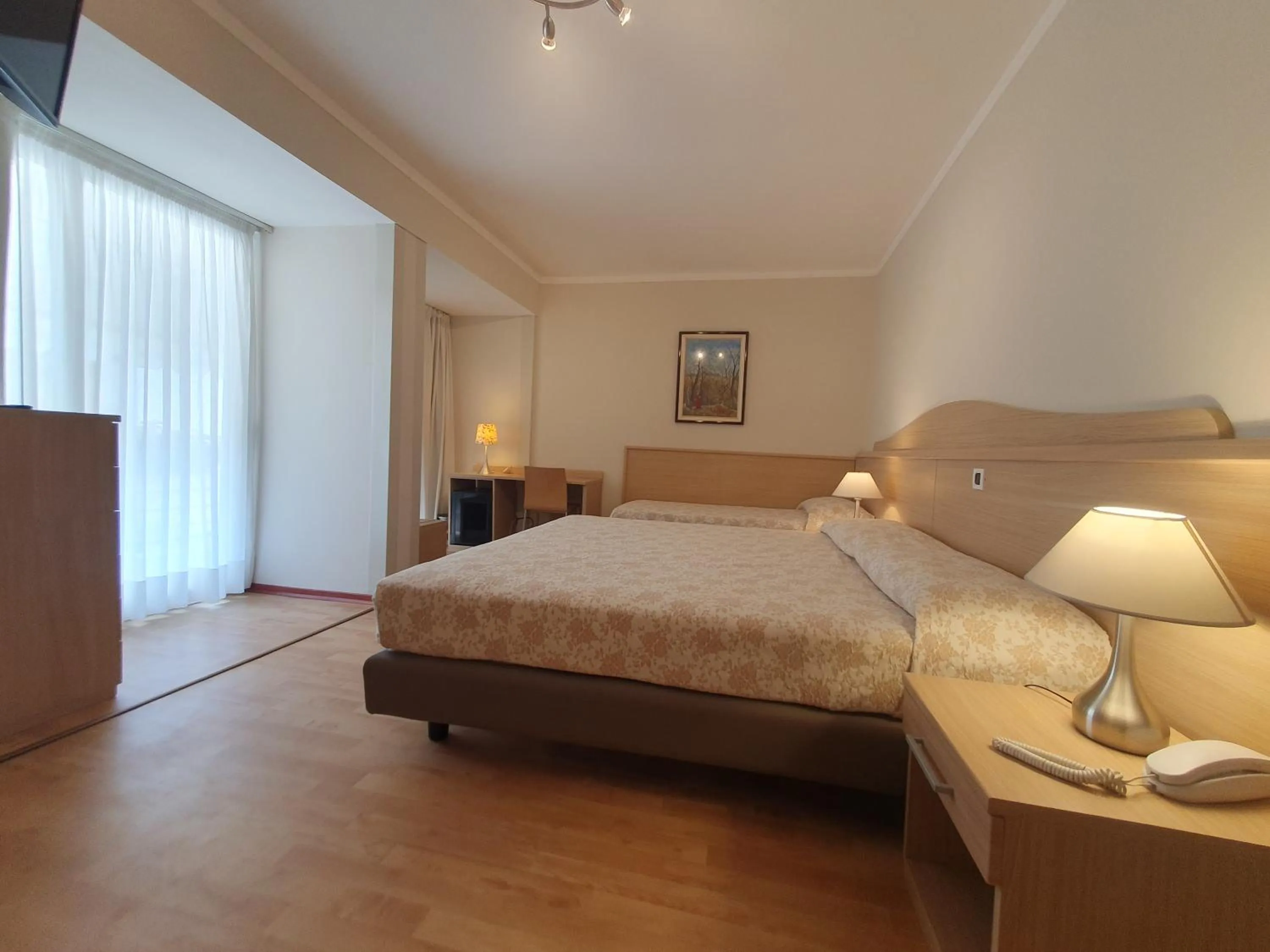 Bed in Hotel Eurovil Garni