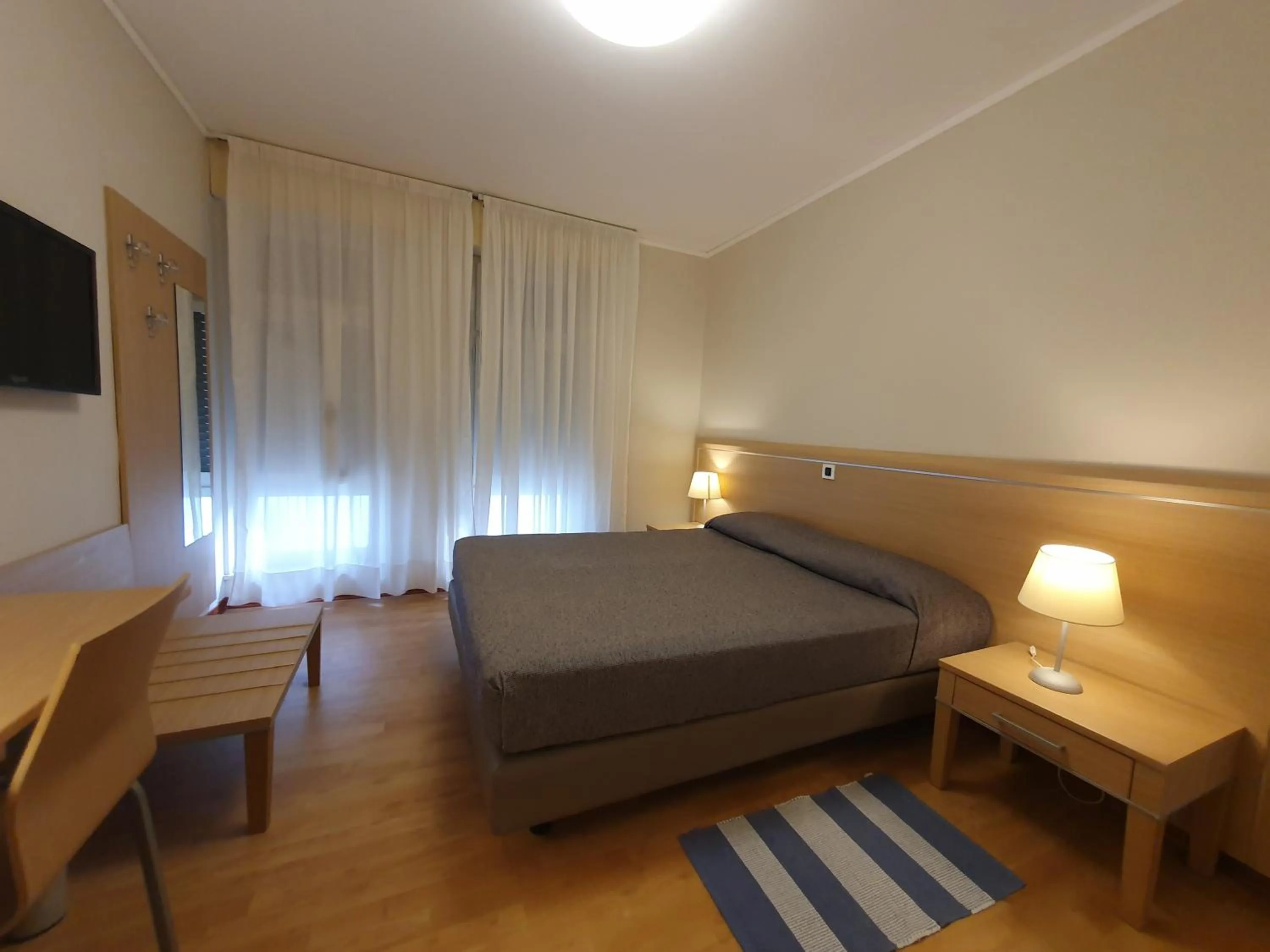 Bed in Hotel Eurovil Garni