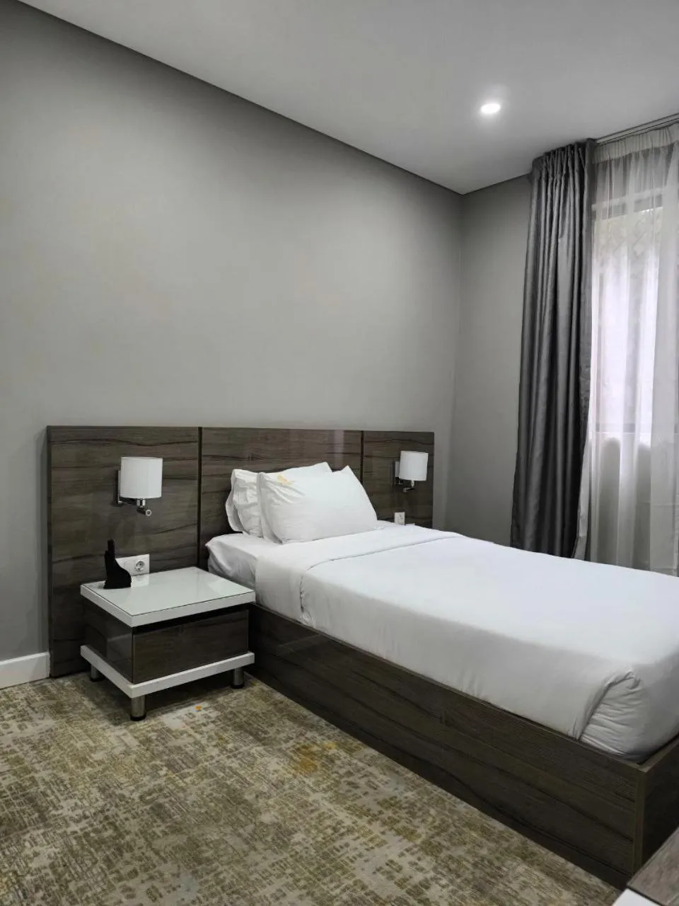 Bed in Polana Plaza Hotel