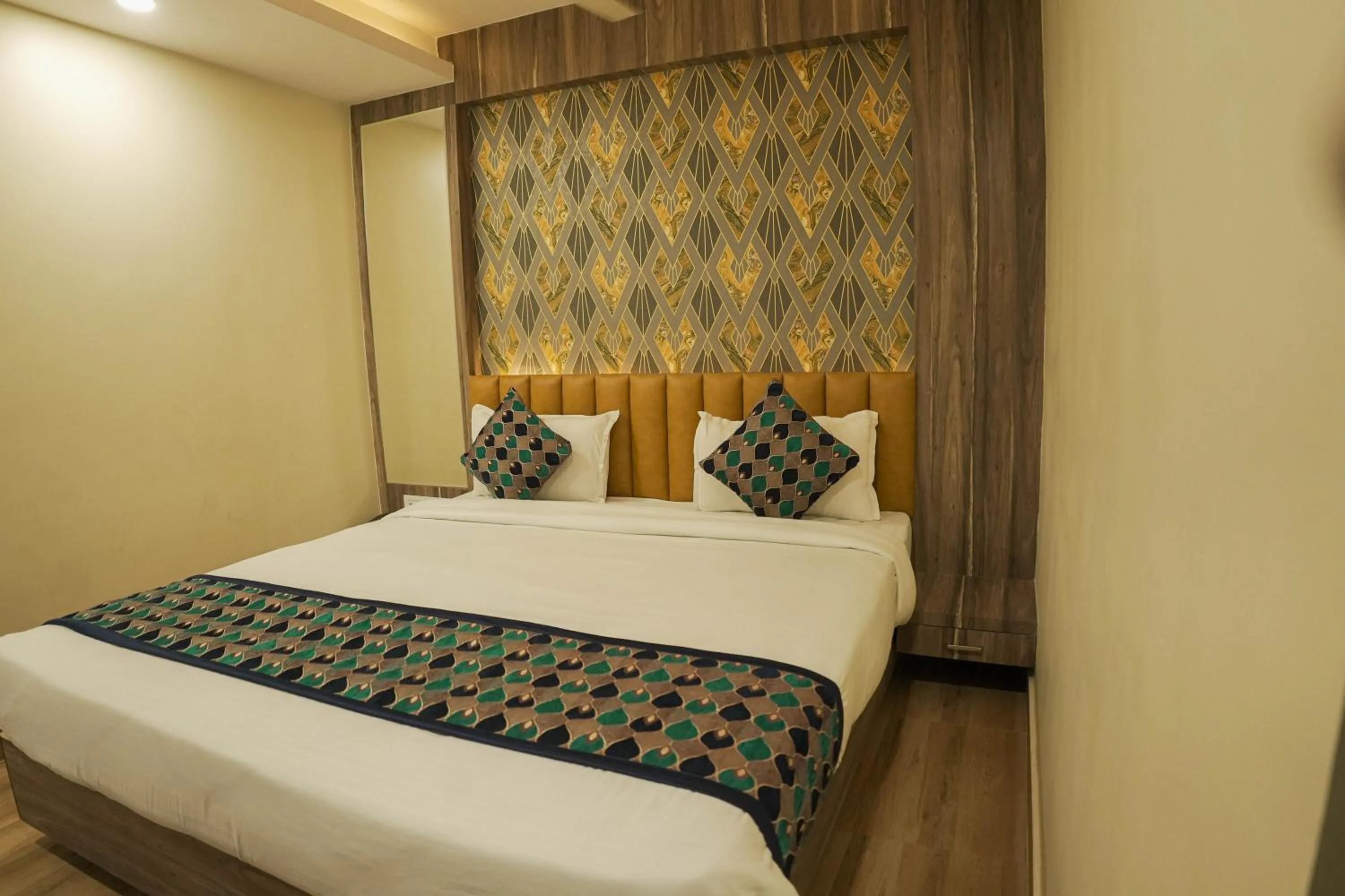 Bed in Hotel Grand Residency
