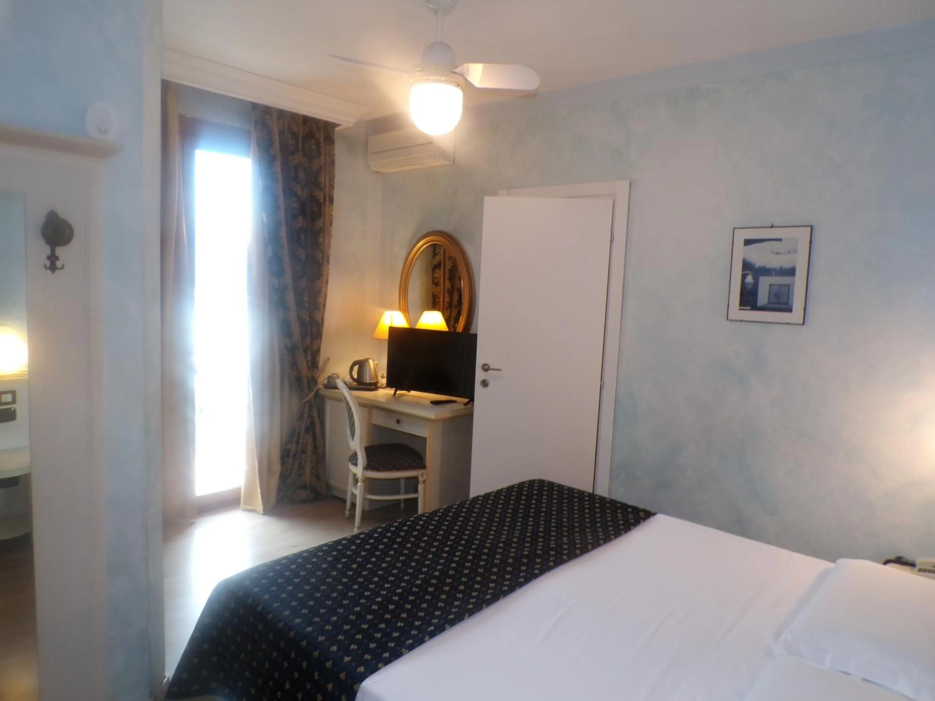 Bed in Hotel San Marino