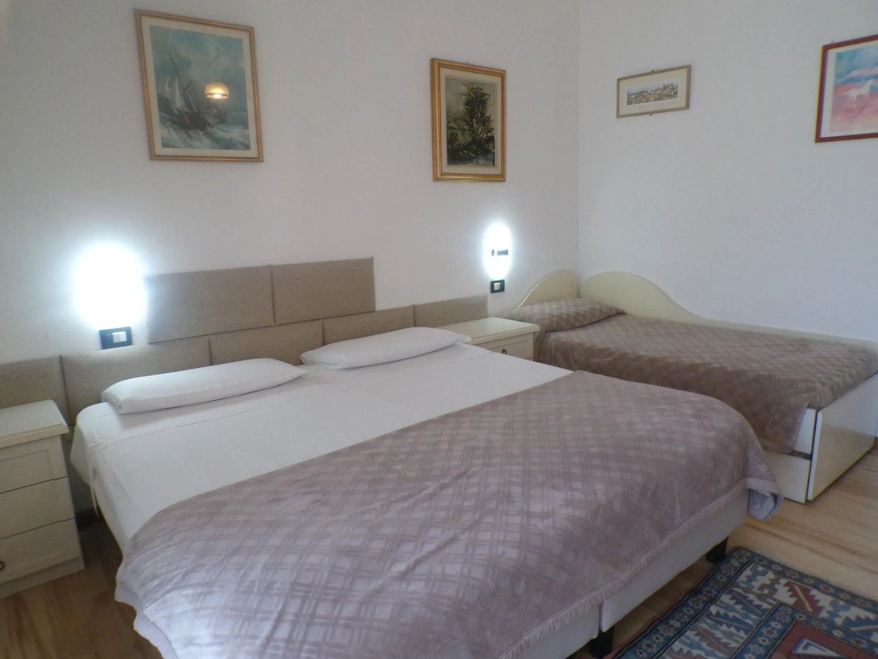 Bed in Hotel San Marino