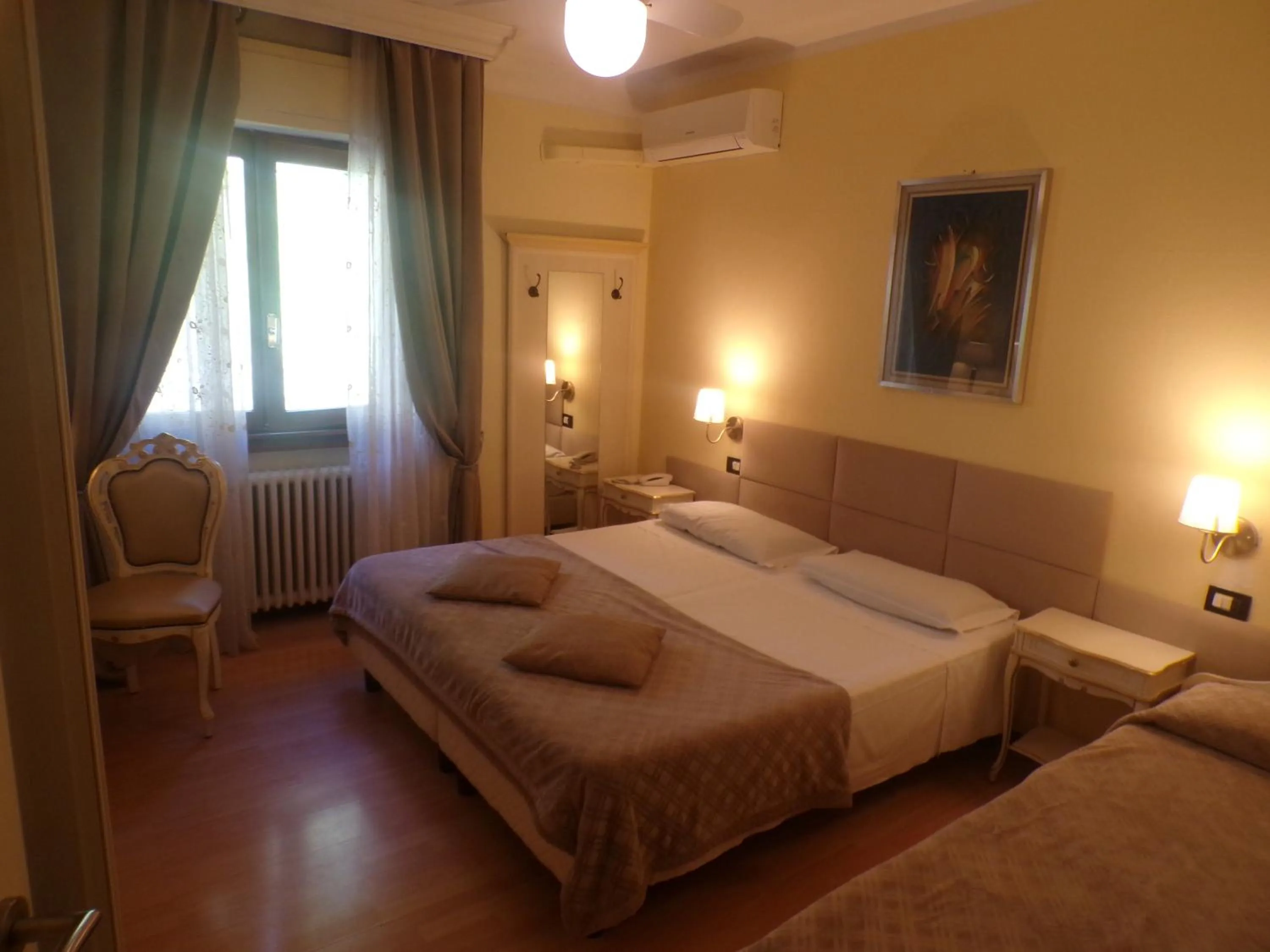 Bed in Hotel San Marino