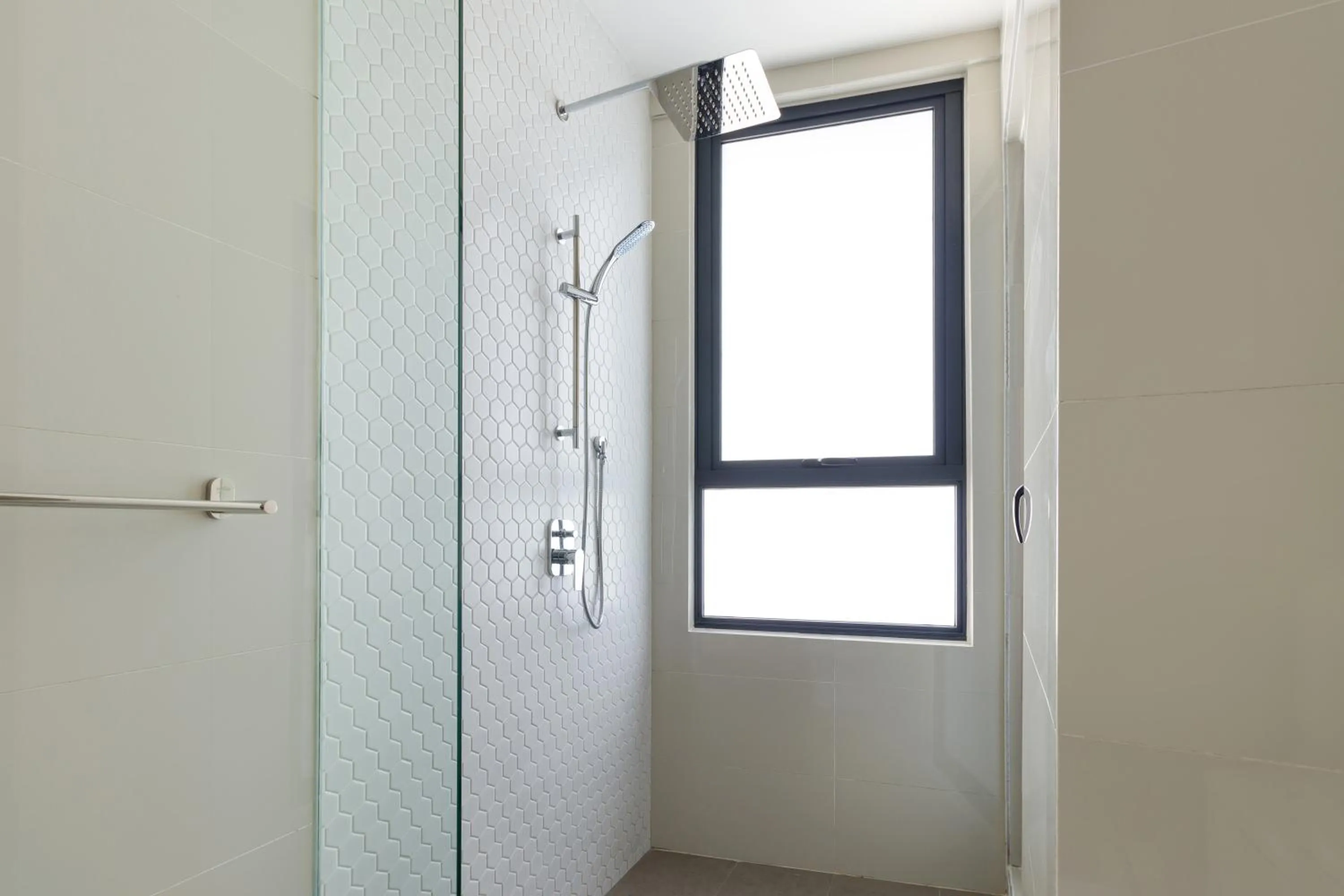 Bathroom in Continew Residensi by Airhost