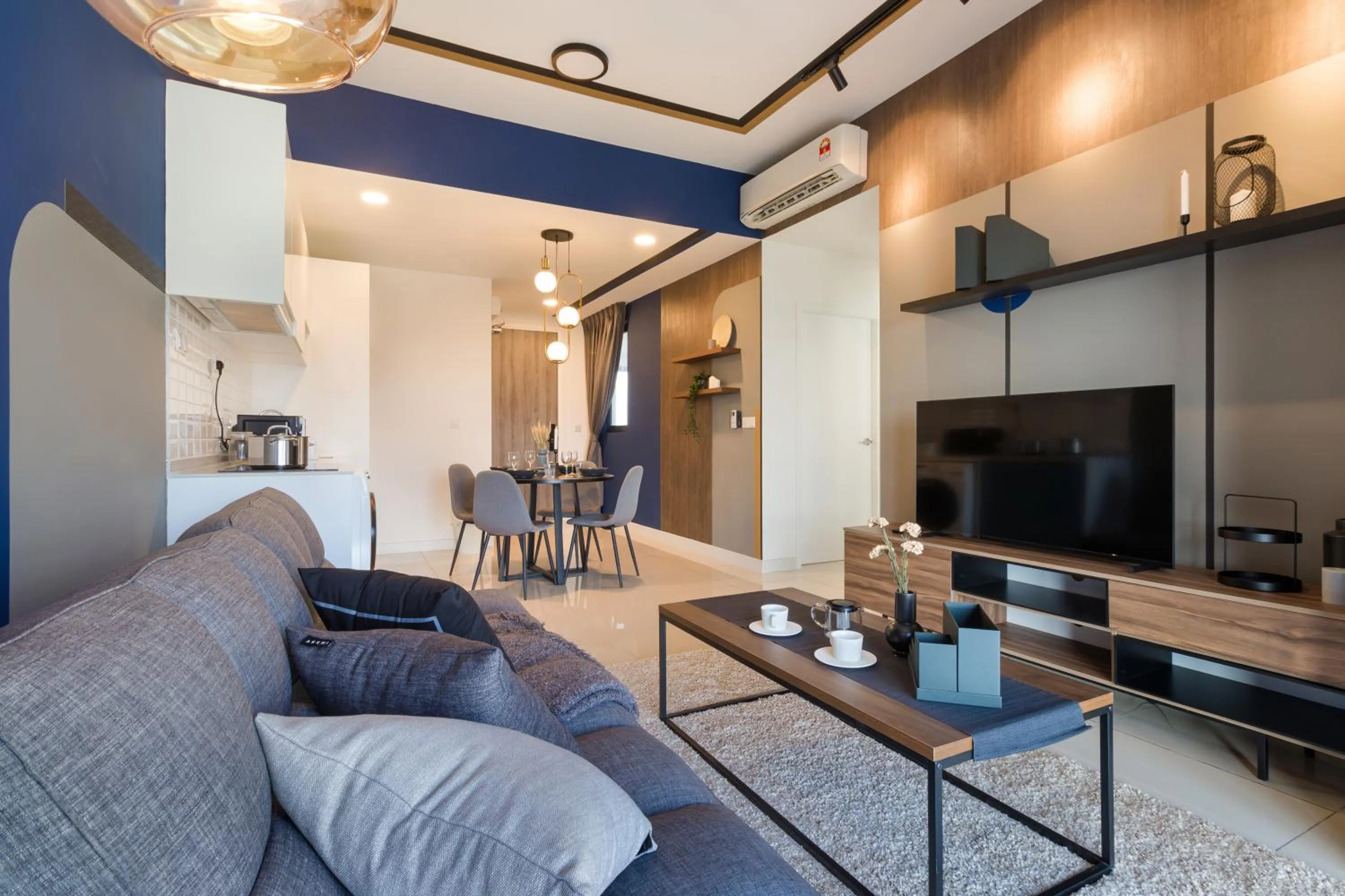 Living room in Continew Residensi by Airhost