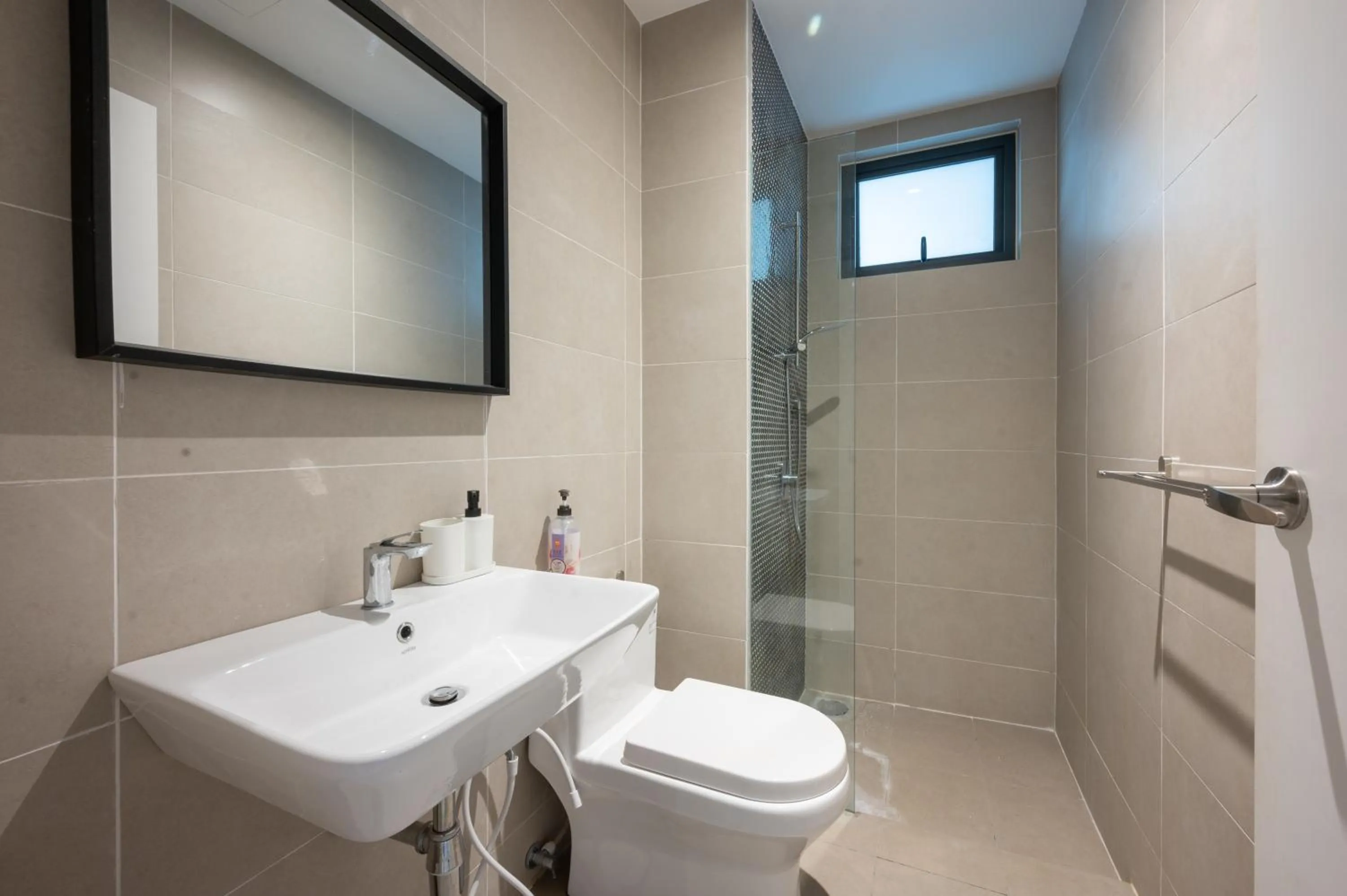 Bathroom in Continew Residensi by Airhost