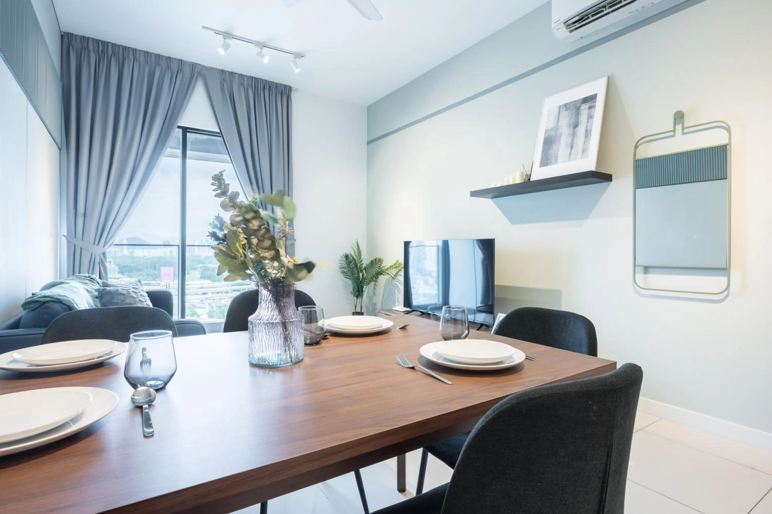 Dining area in Continew Residensi by Airhost