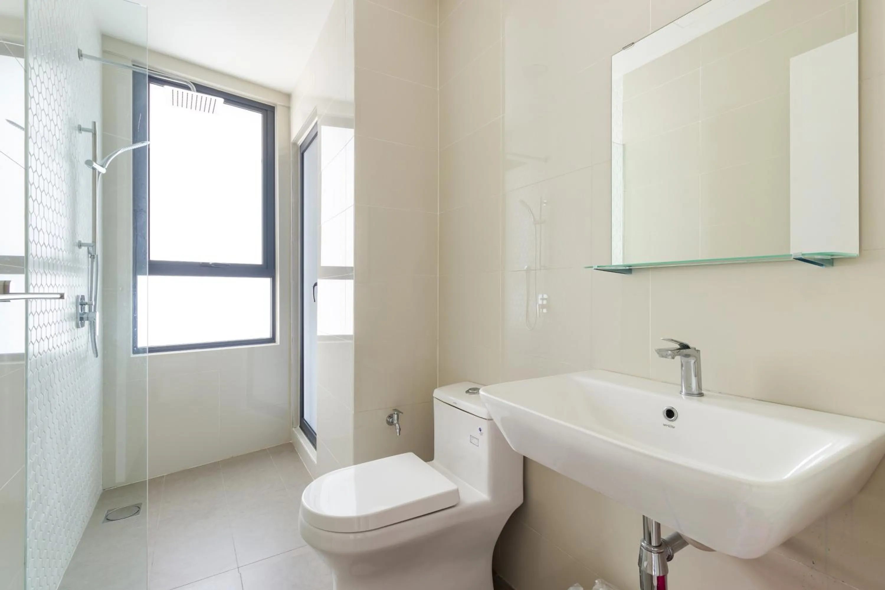 Bathroom in Continew Residensi by Airhost