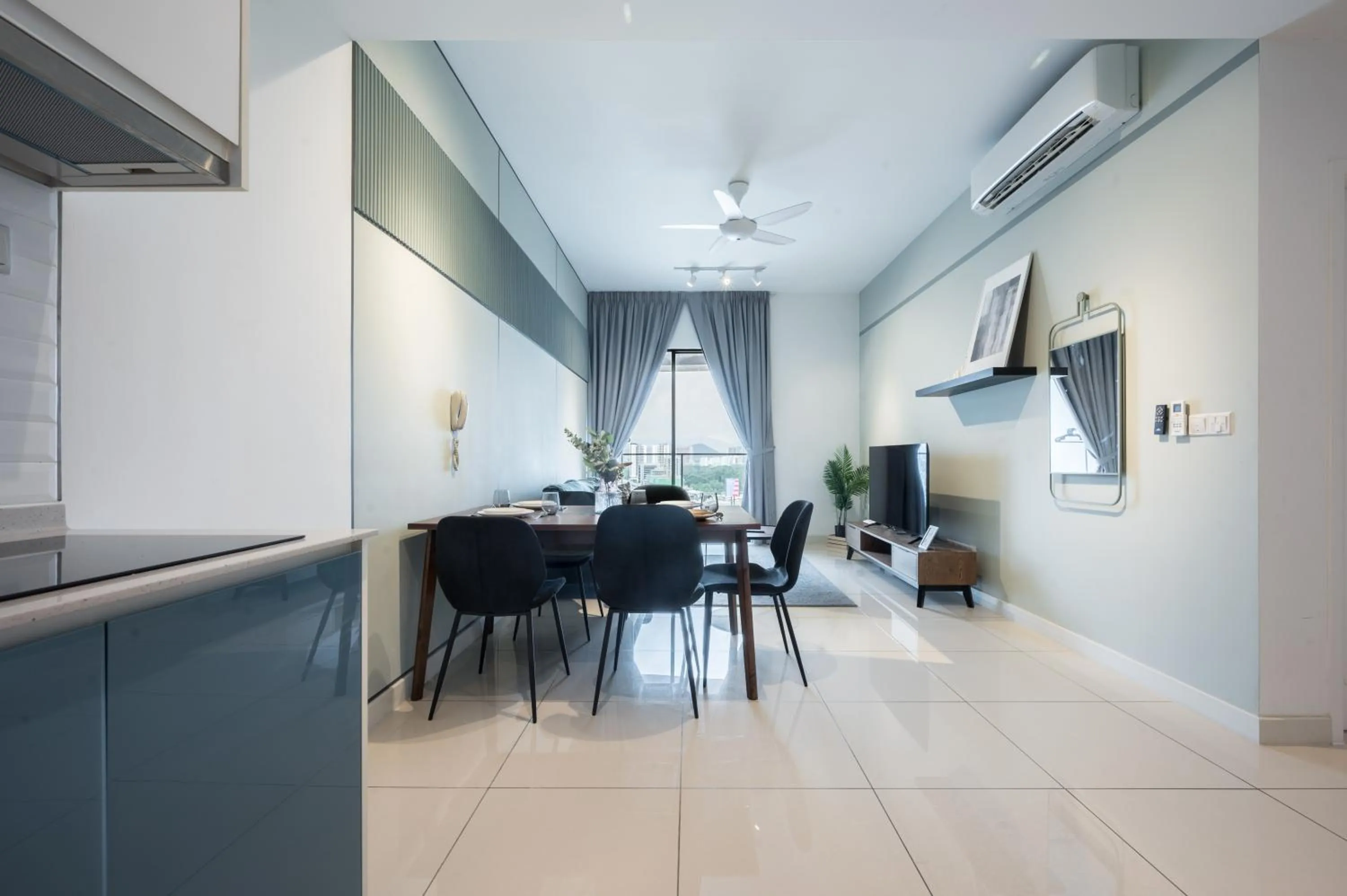 Living room in Continew Residensi by Airhost