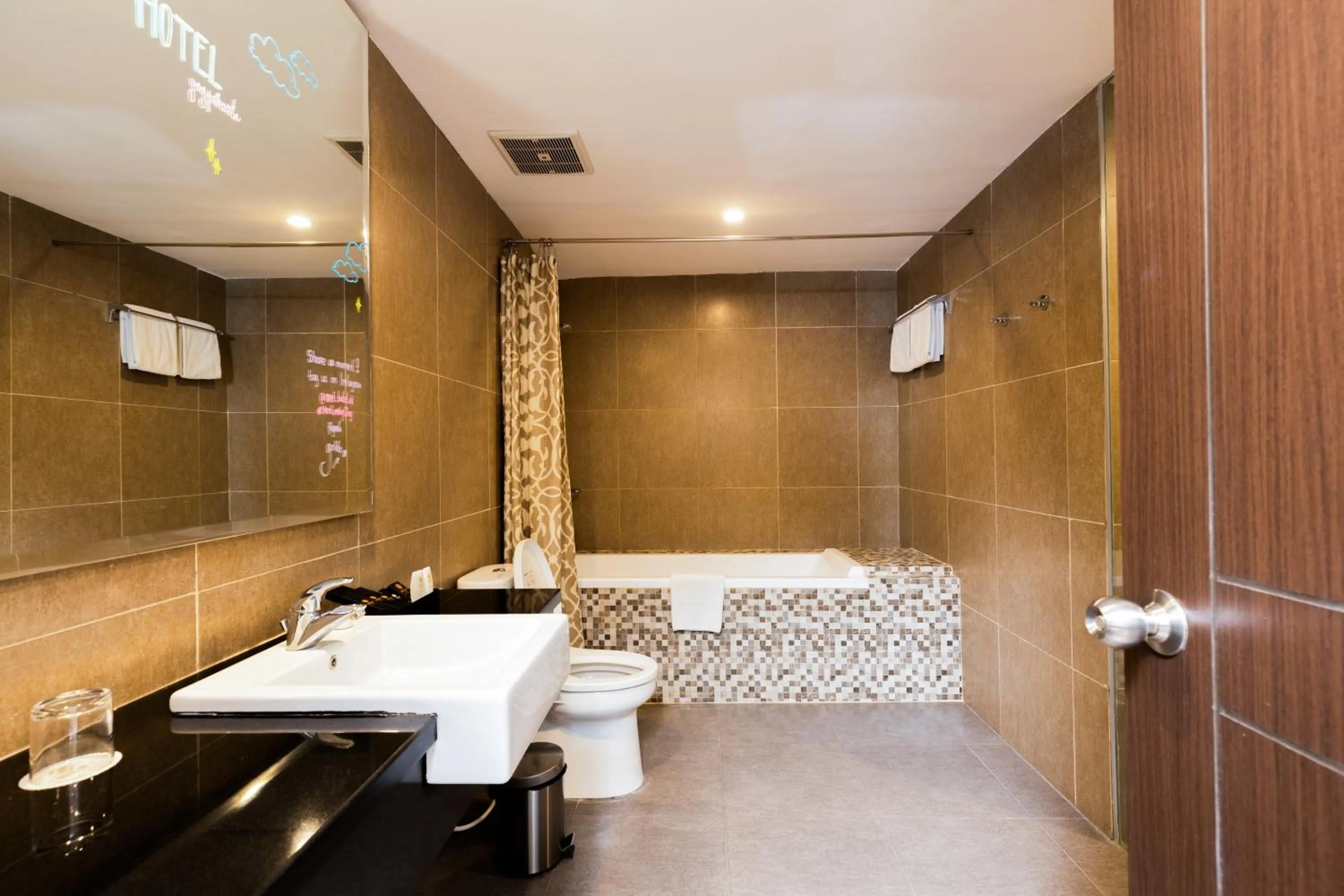 Bathroom in Next Hotel Yogyakarta