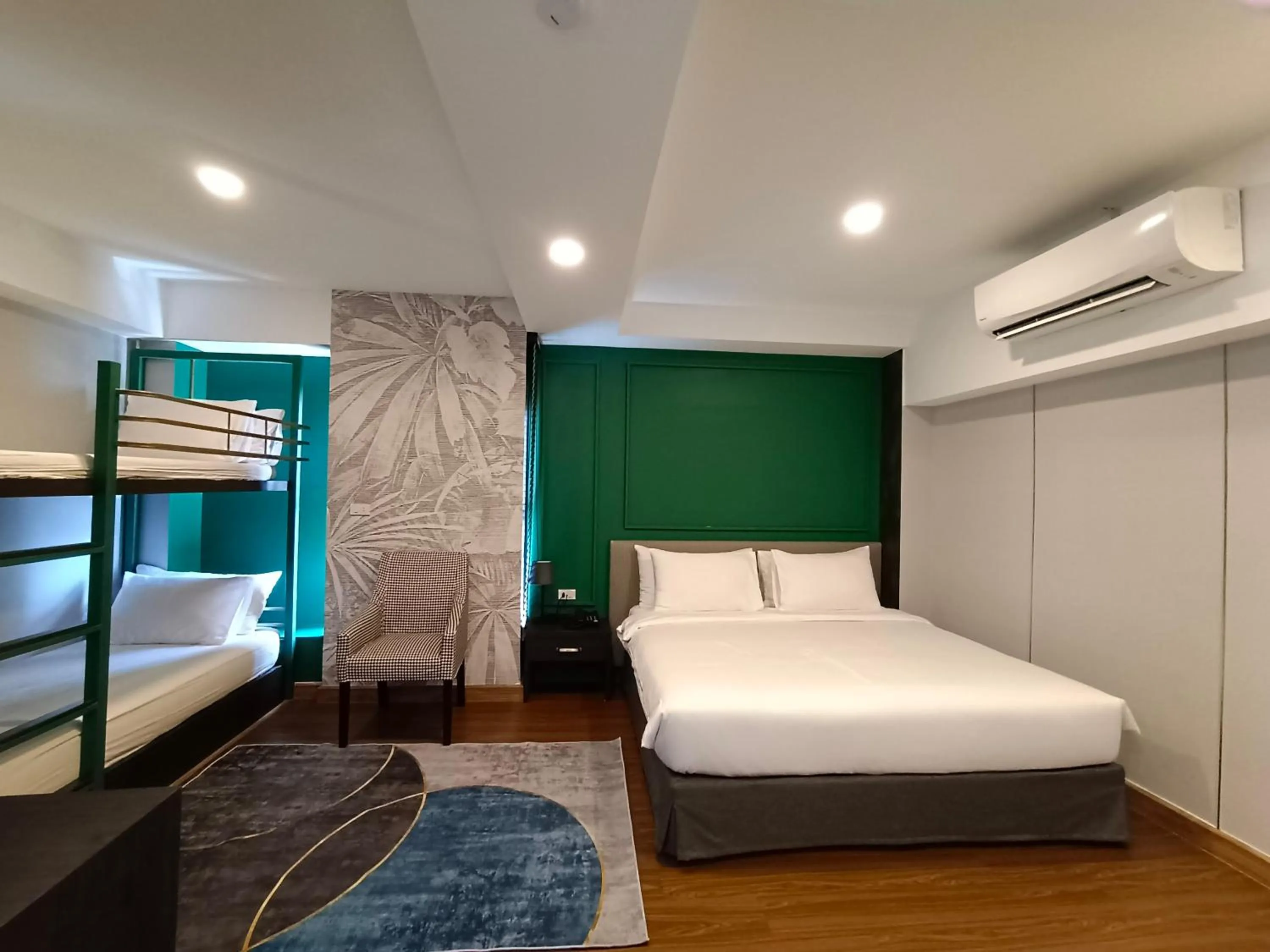 Bed in VIVA LA VIDA HOTEL