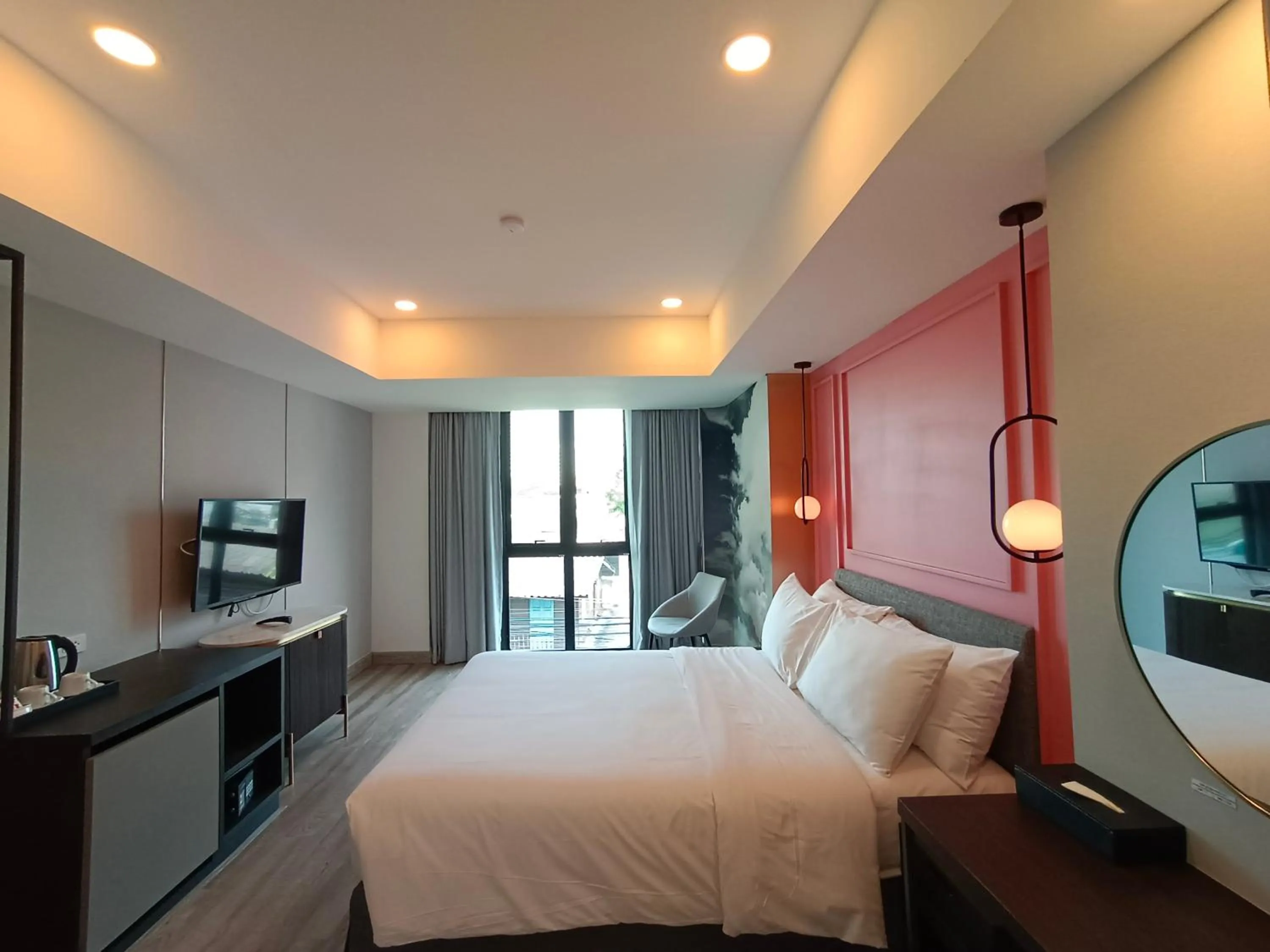 Bed in VIVA LA VIDA HOTEL