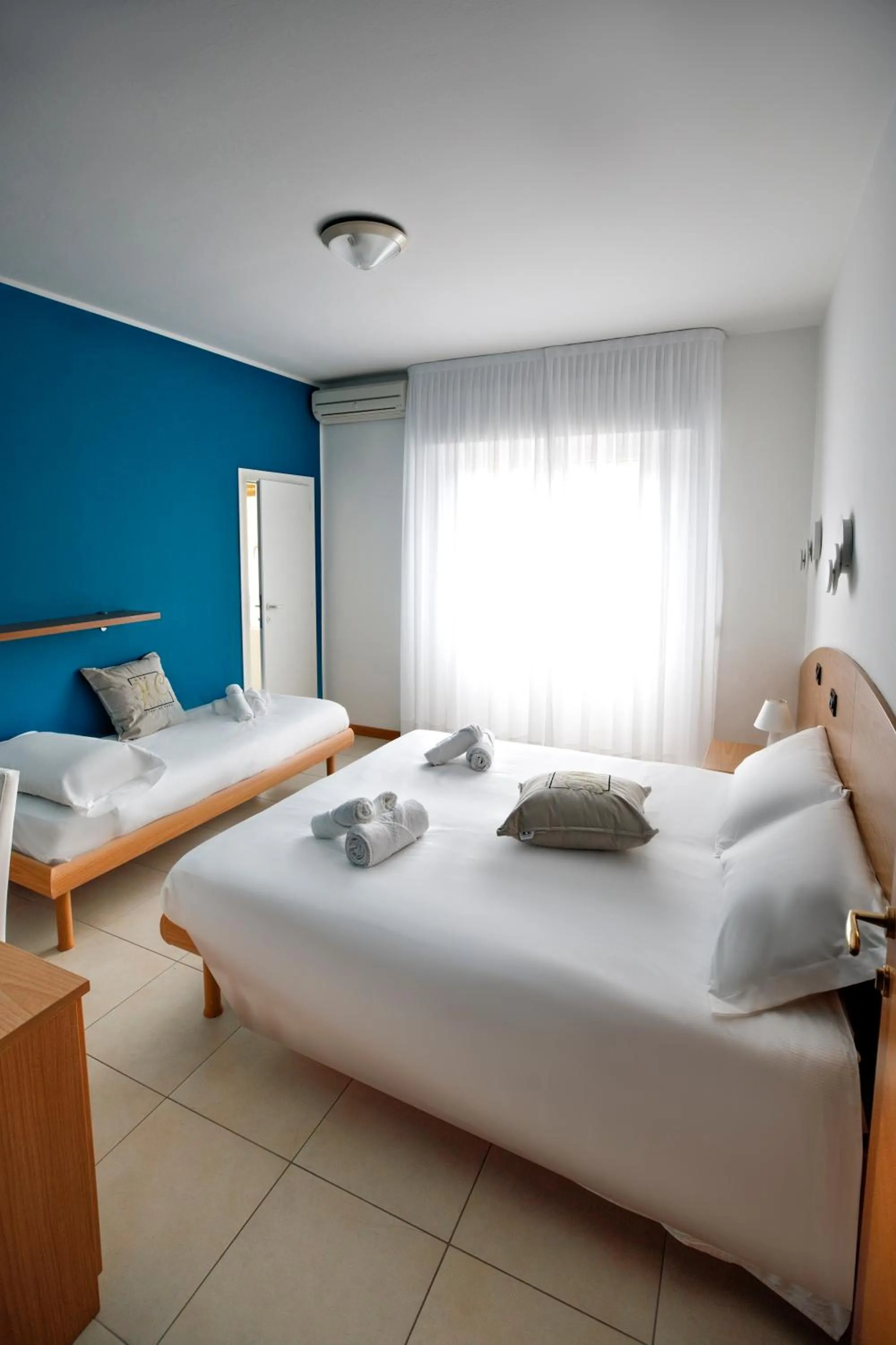 Bedroom, Bed in Hotel Hc Resort Lignano