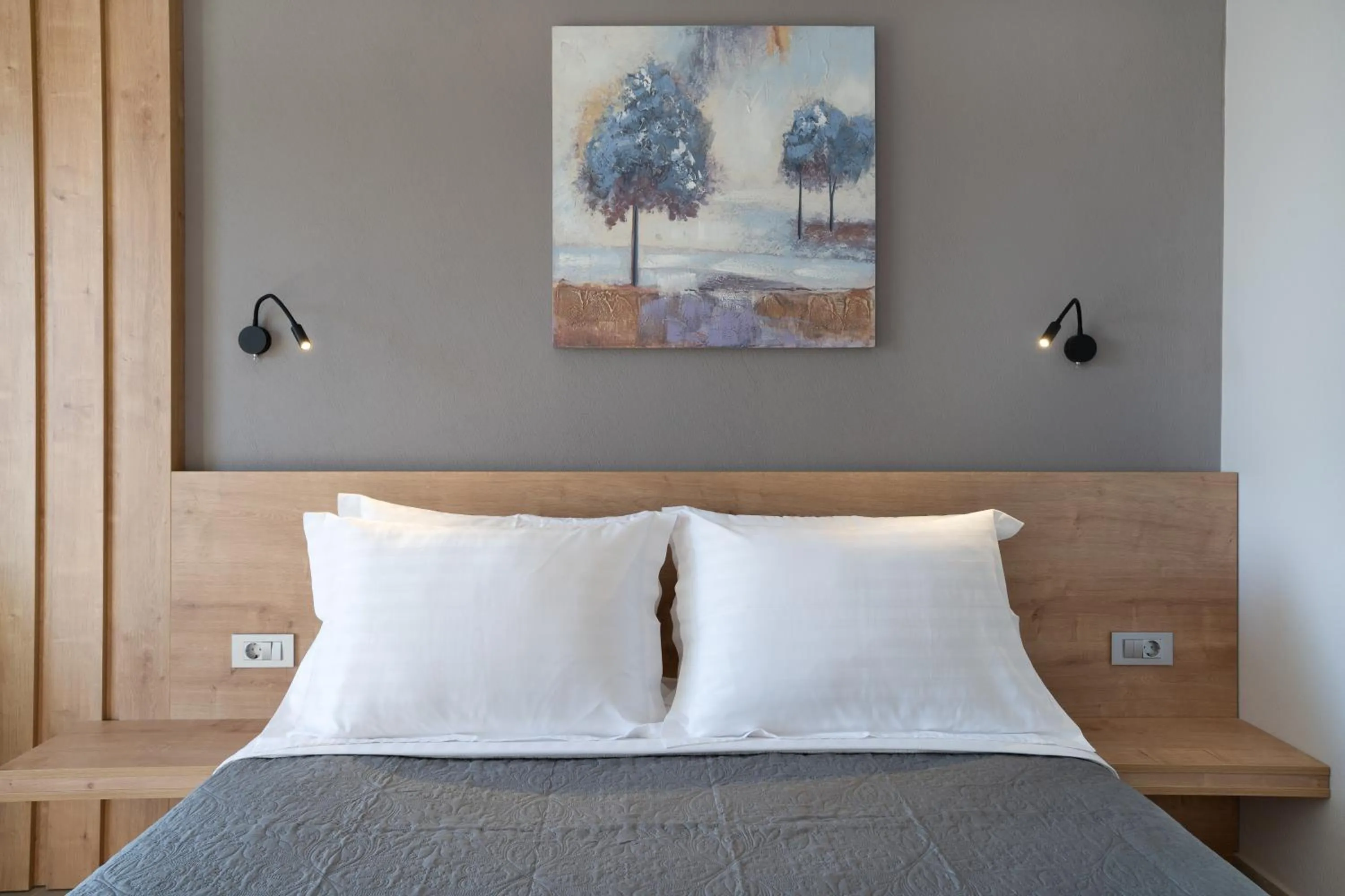 Bed in Sarah Luxury Rooms