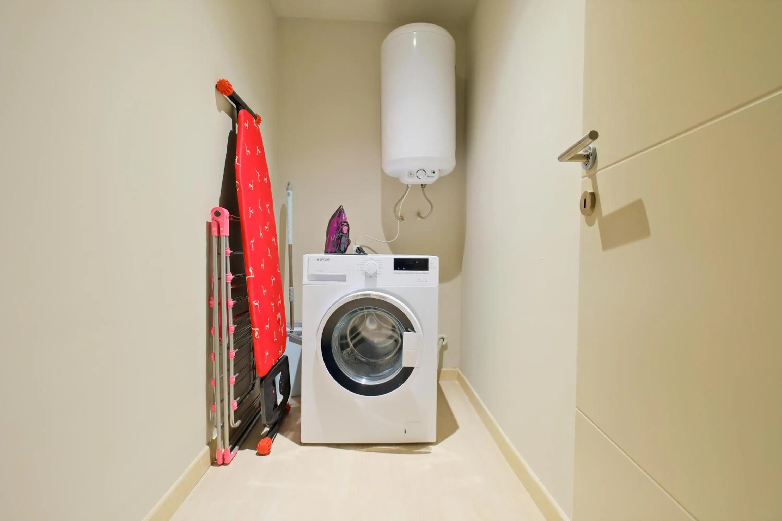 washing machine in New Inn Hotel Cadde 54 Mall