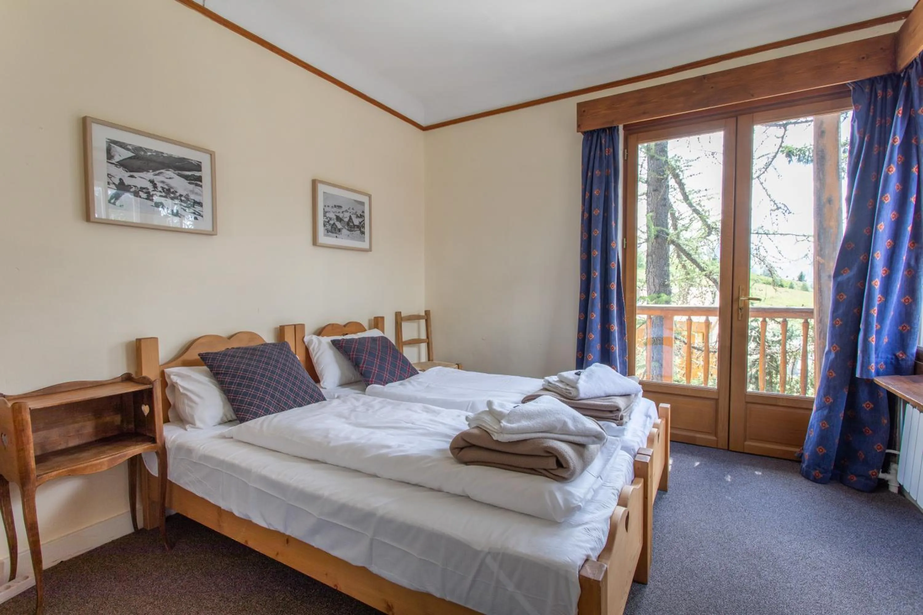 Bed in Hotel le Chamois