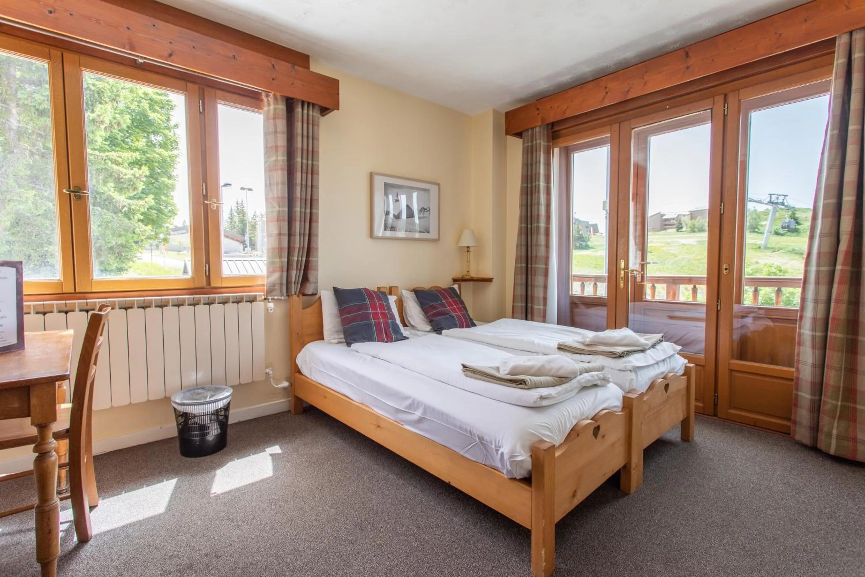 Bed in Hotel le Chamois