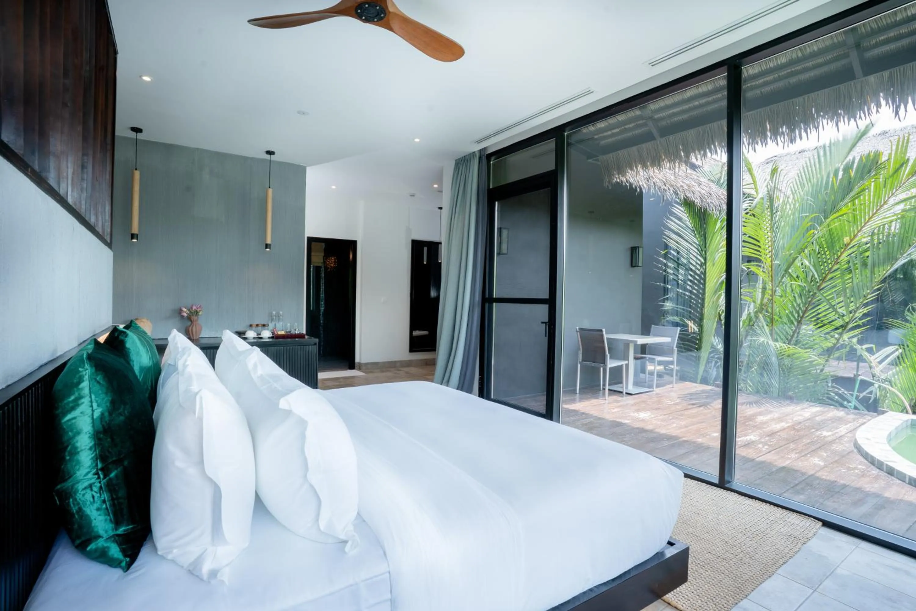 Bed in RiverTree Villa & Resort