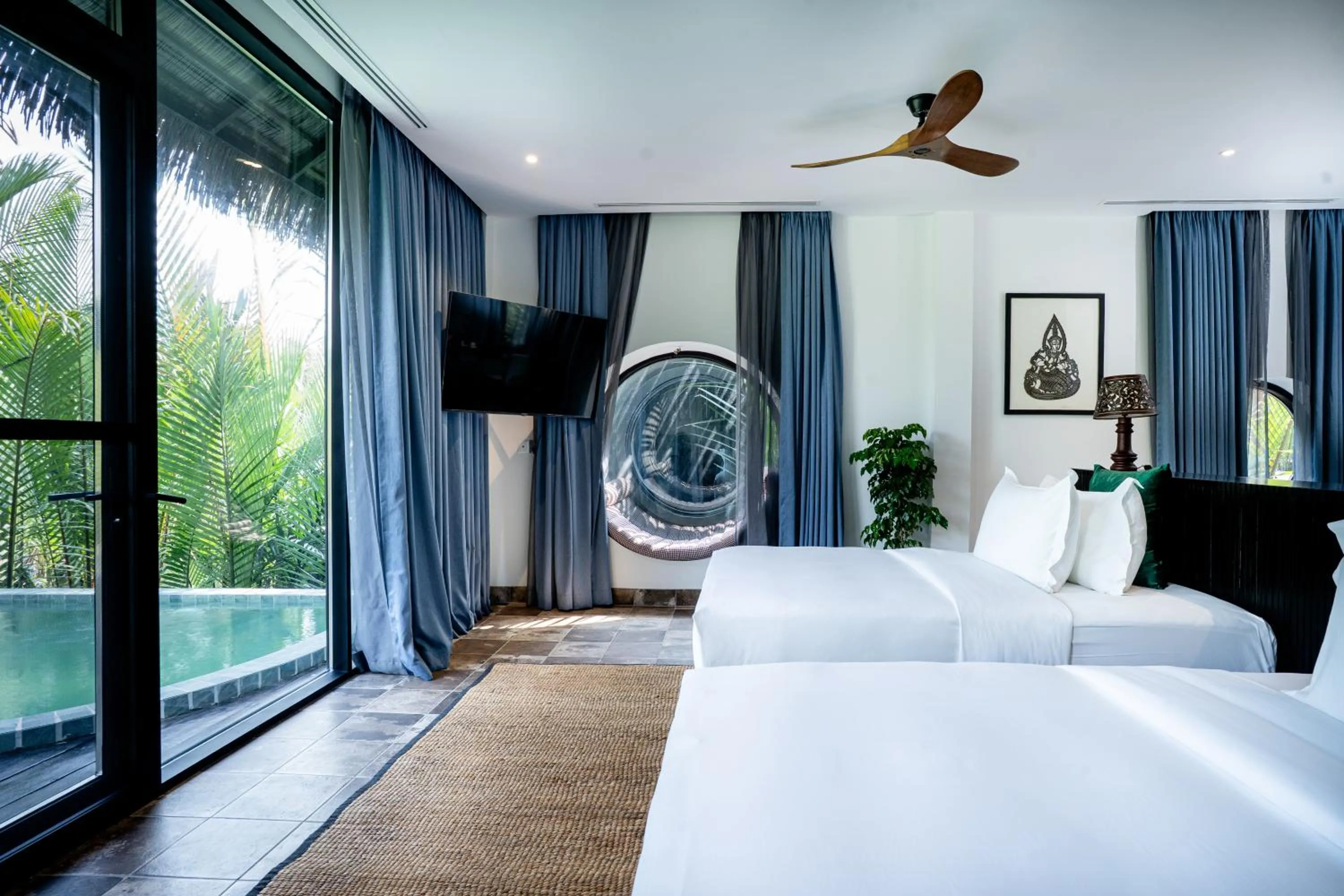 Bed in RiverTree Villa & Resort