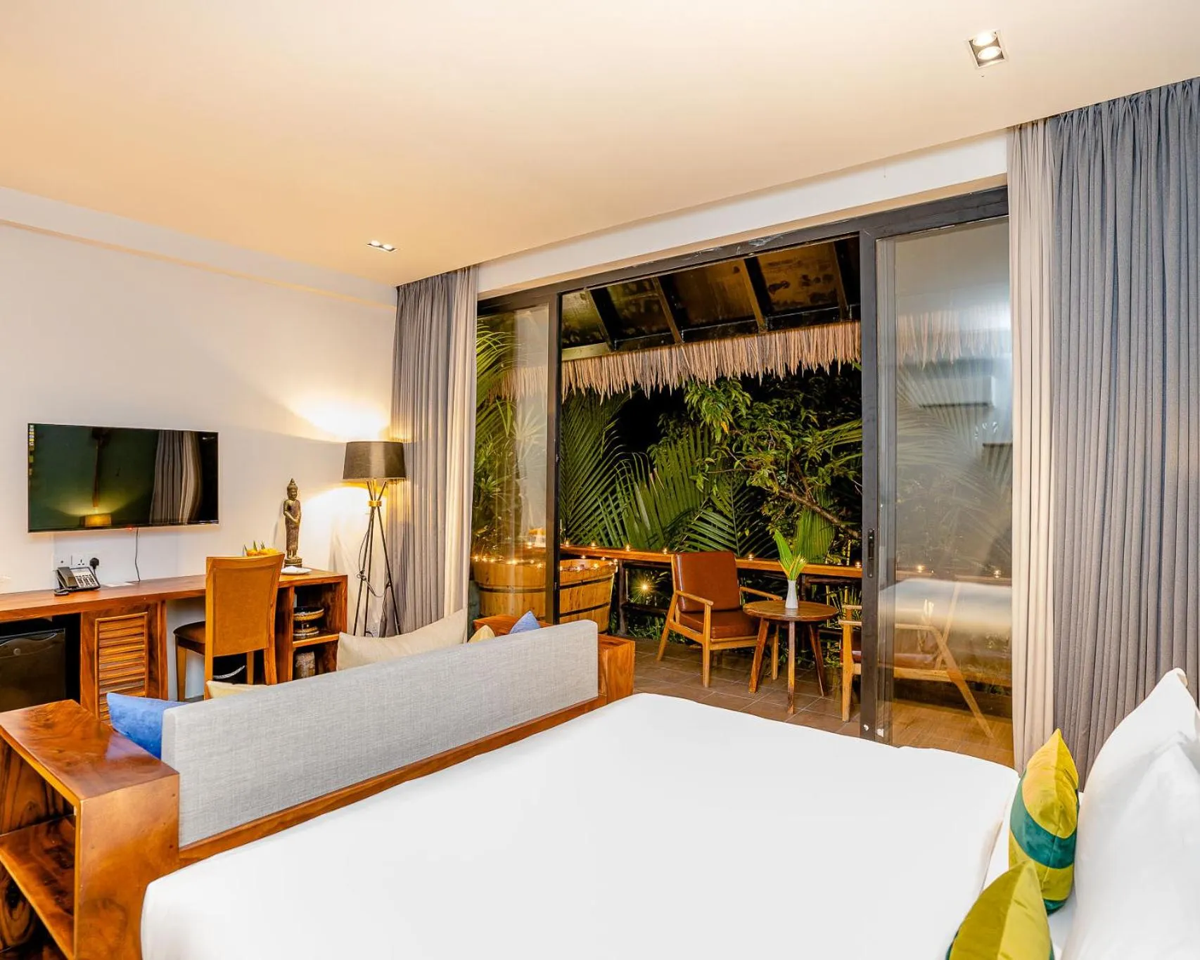 Bed in RiverTree Villa & Resort