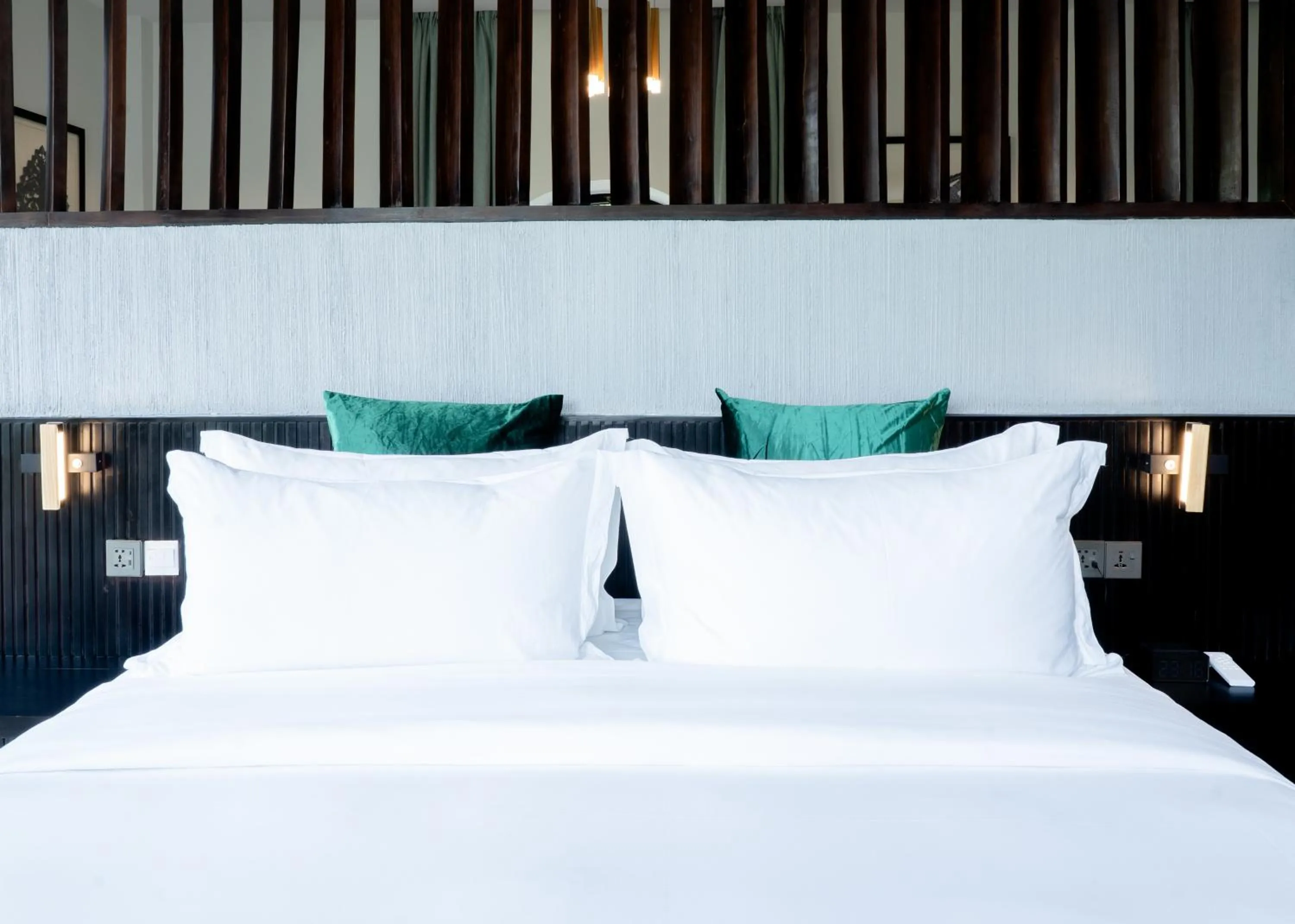 Bed in RiverTree Villa & Resort