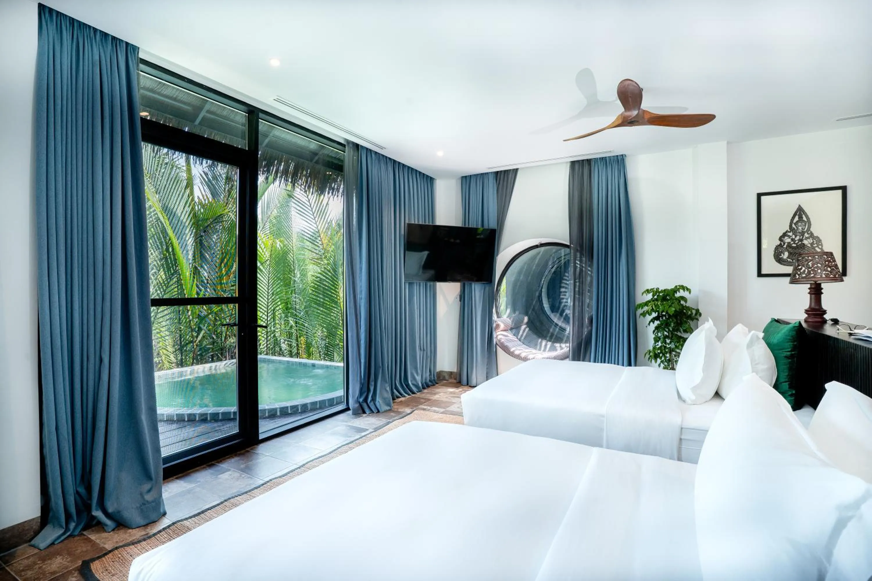 Bed in RiverTree Villa & Resort