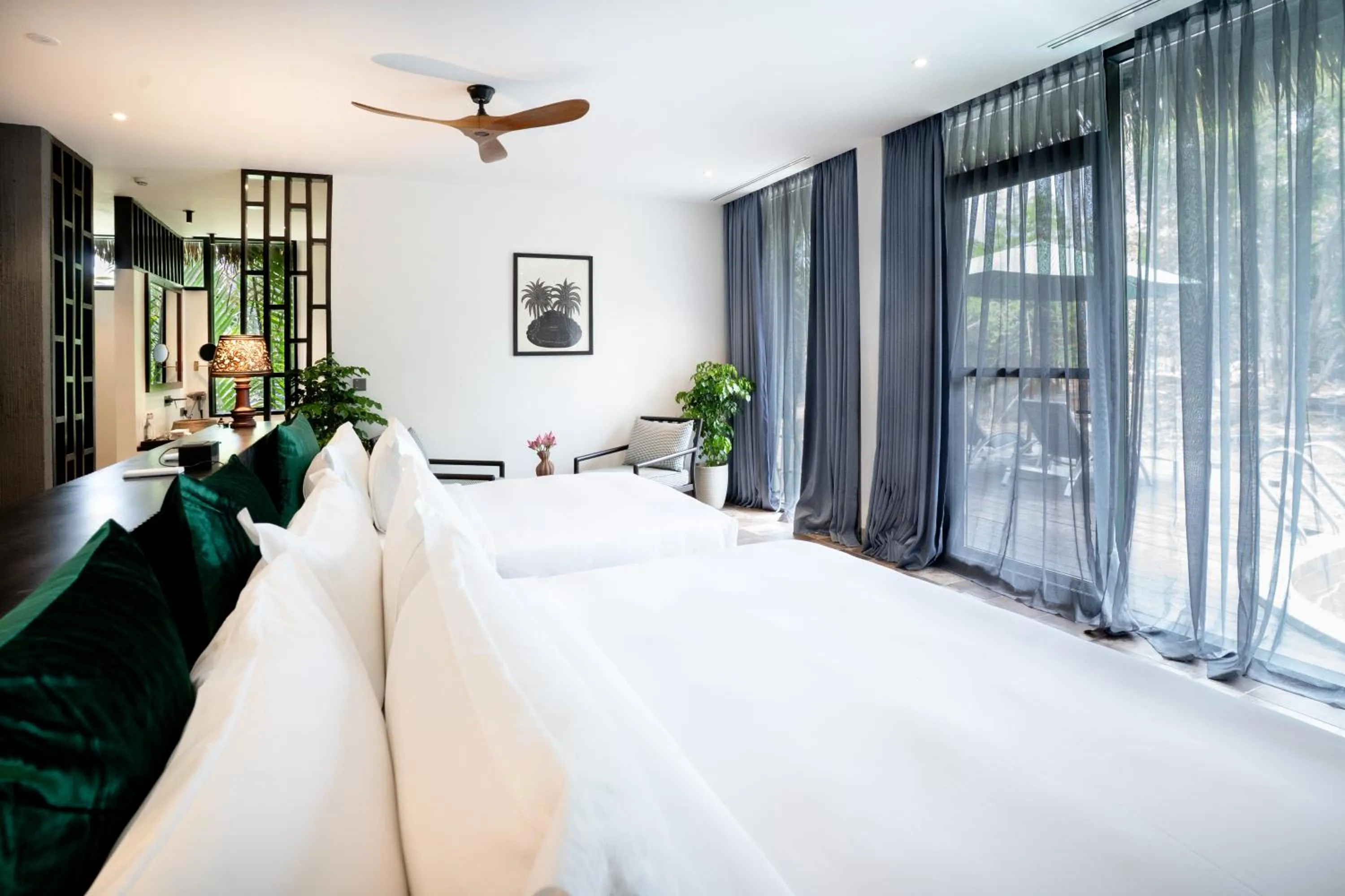 Bed in RiverTree Villa & Resort