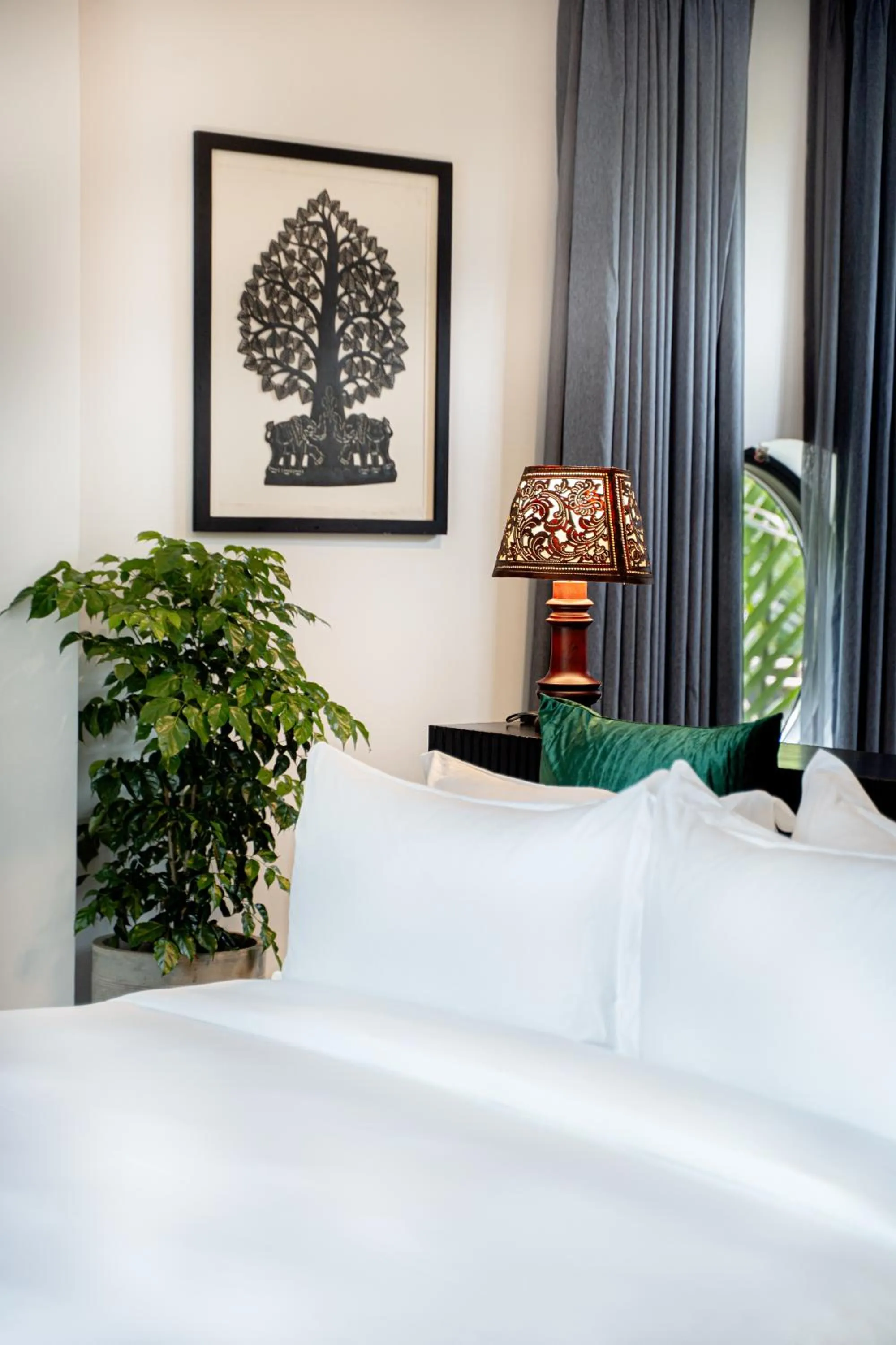 Bed in RiverTree Villa & Resort