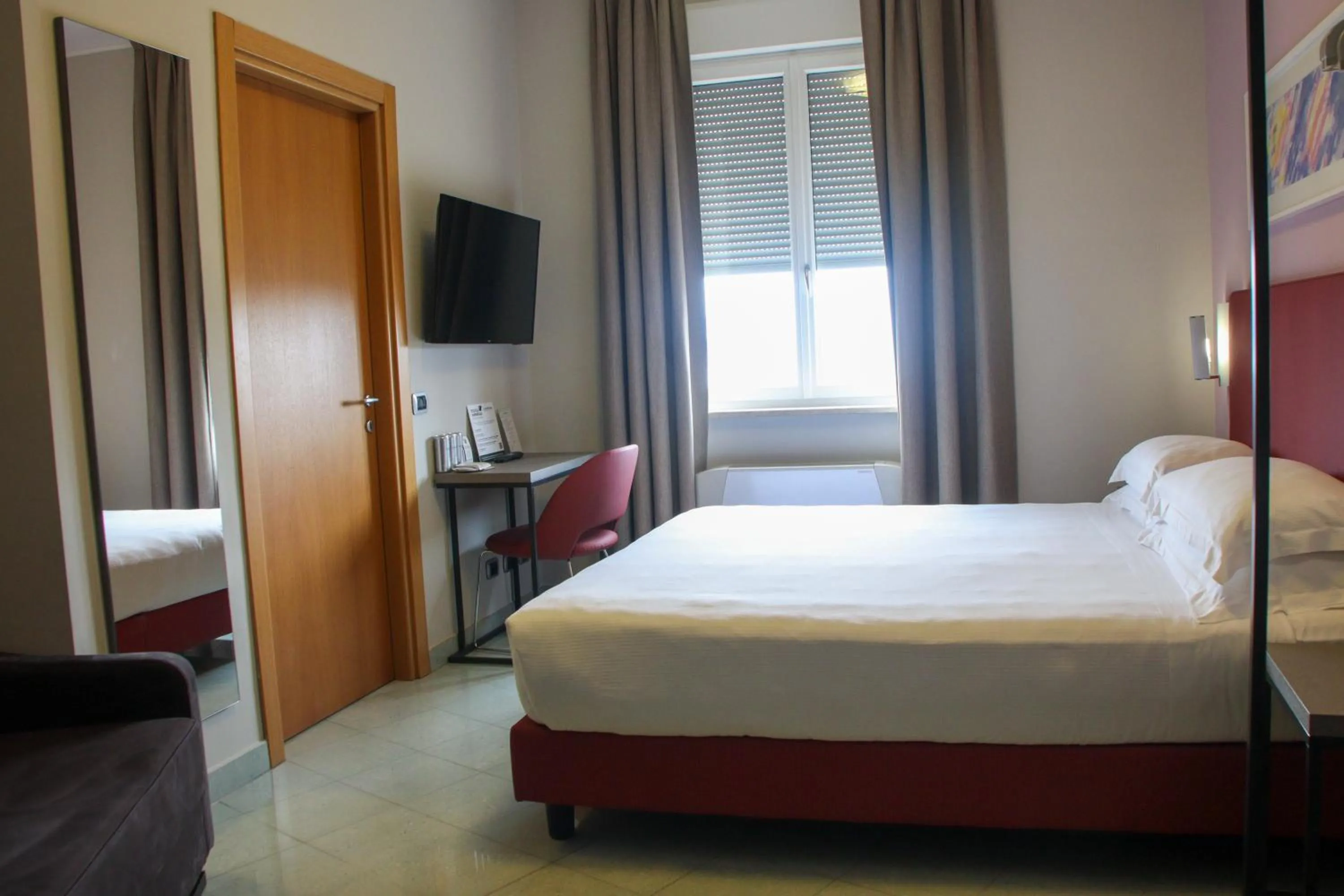 Photo of the whole room, Bed in HH Il Gabbiano