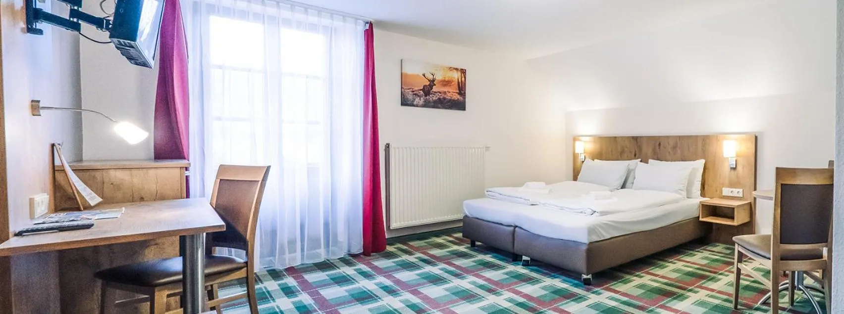 Bed in Gasthaus Kampenwand Bernau