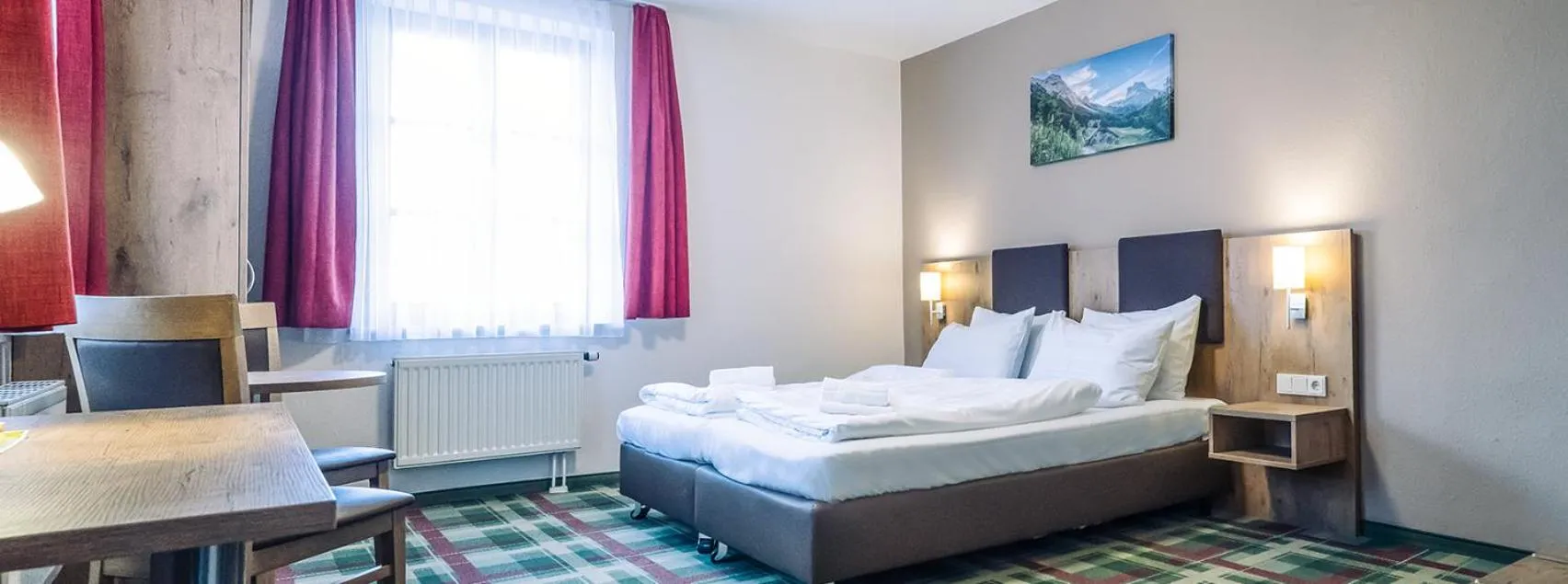 Bed in Gasthaus Kampenwand Bernau