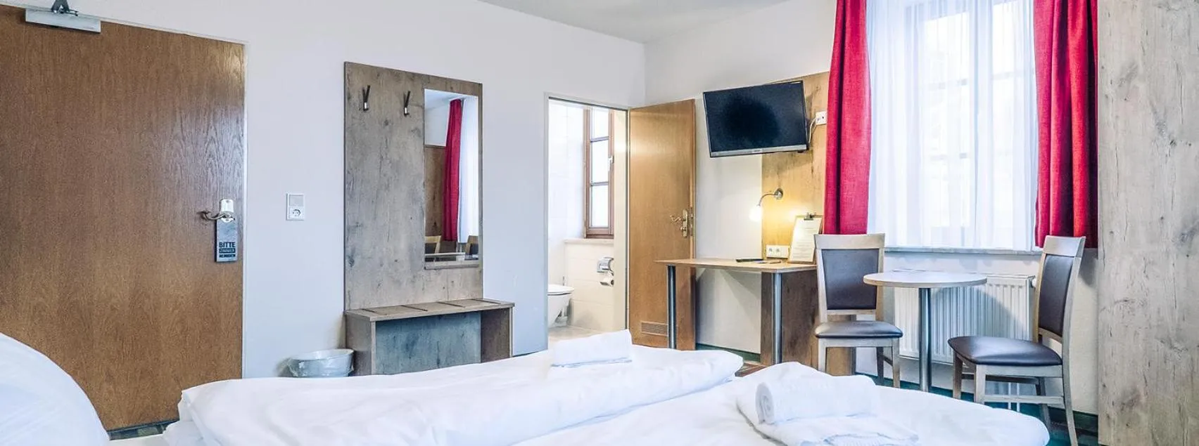 Bed in Gasthaus Kampenwand Bernau