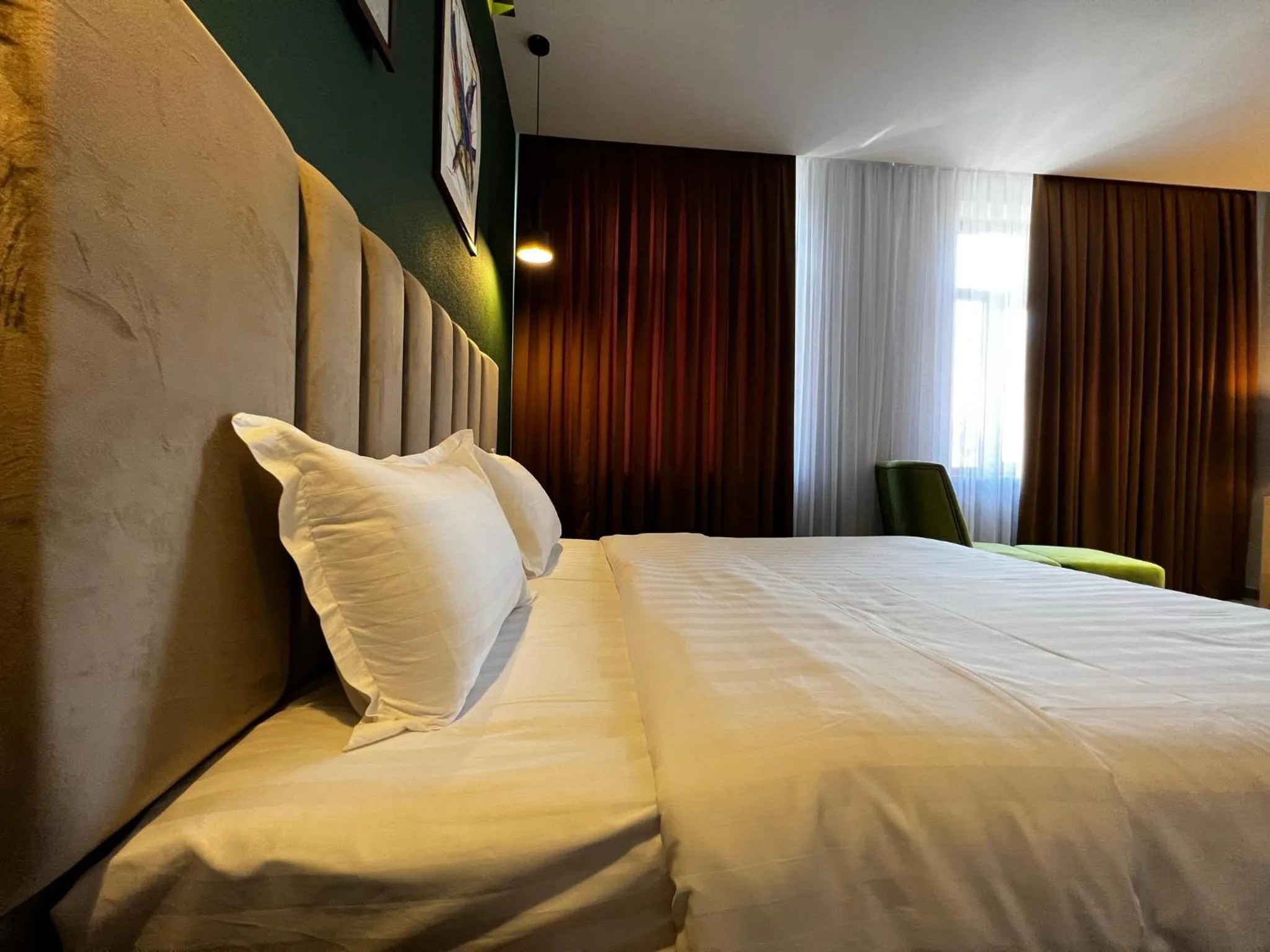 Bed in King Plaza Hotel