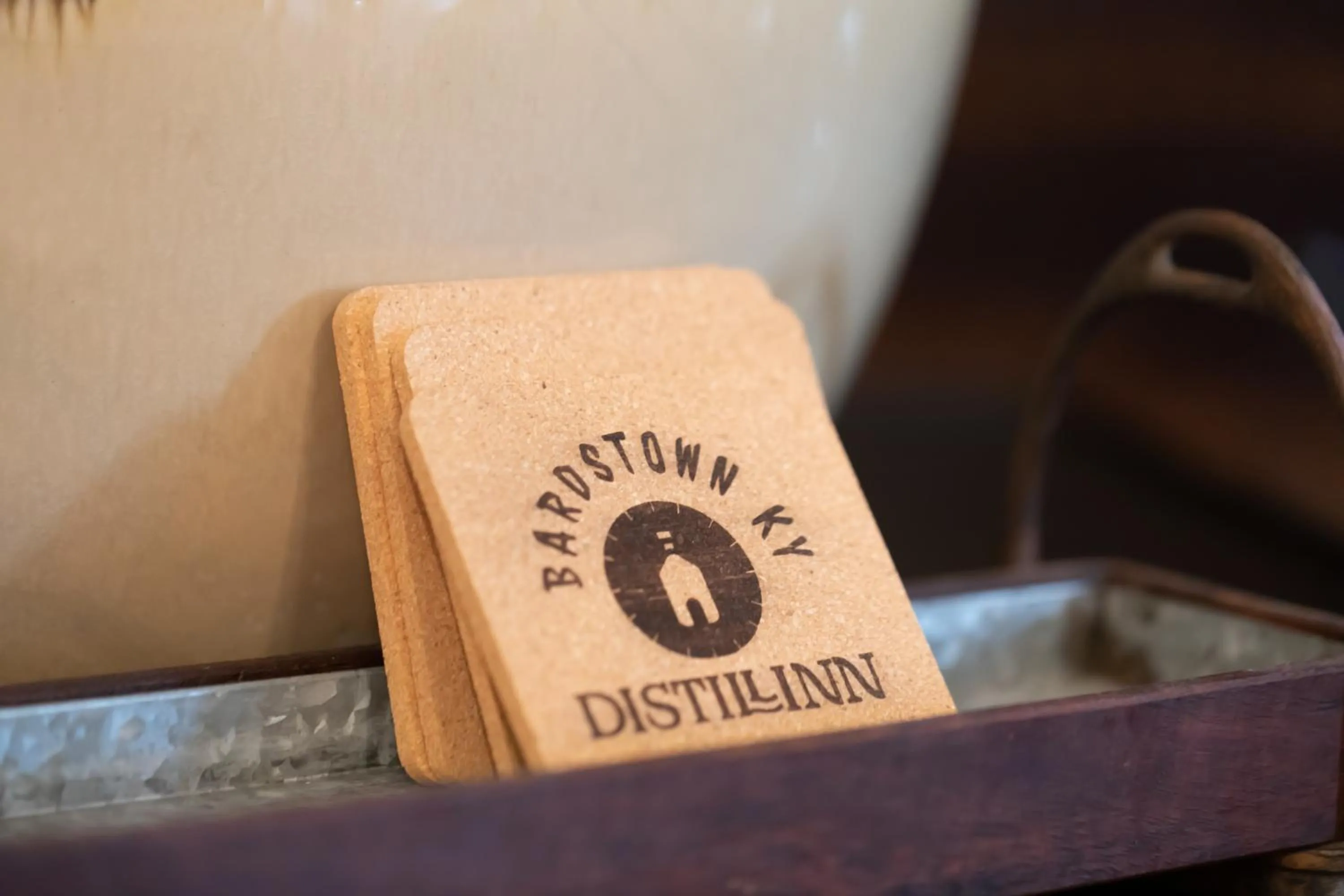 Property logo or sign in Distill-Inn