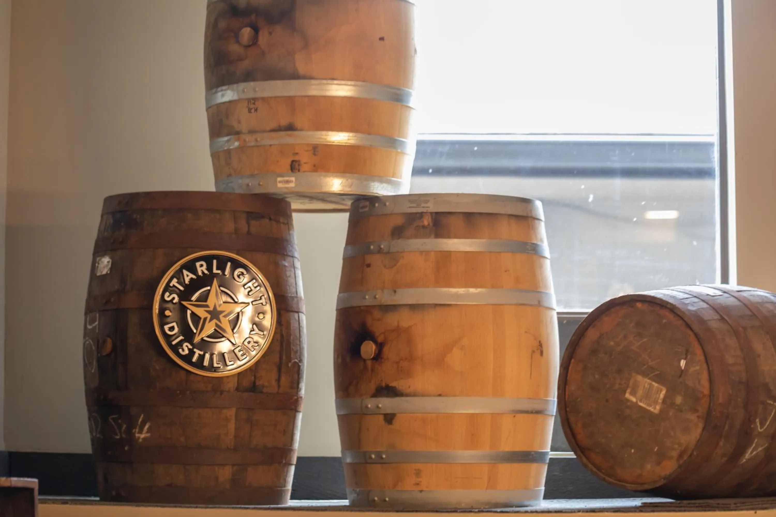 Property logo or sign in Distill-Inn