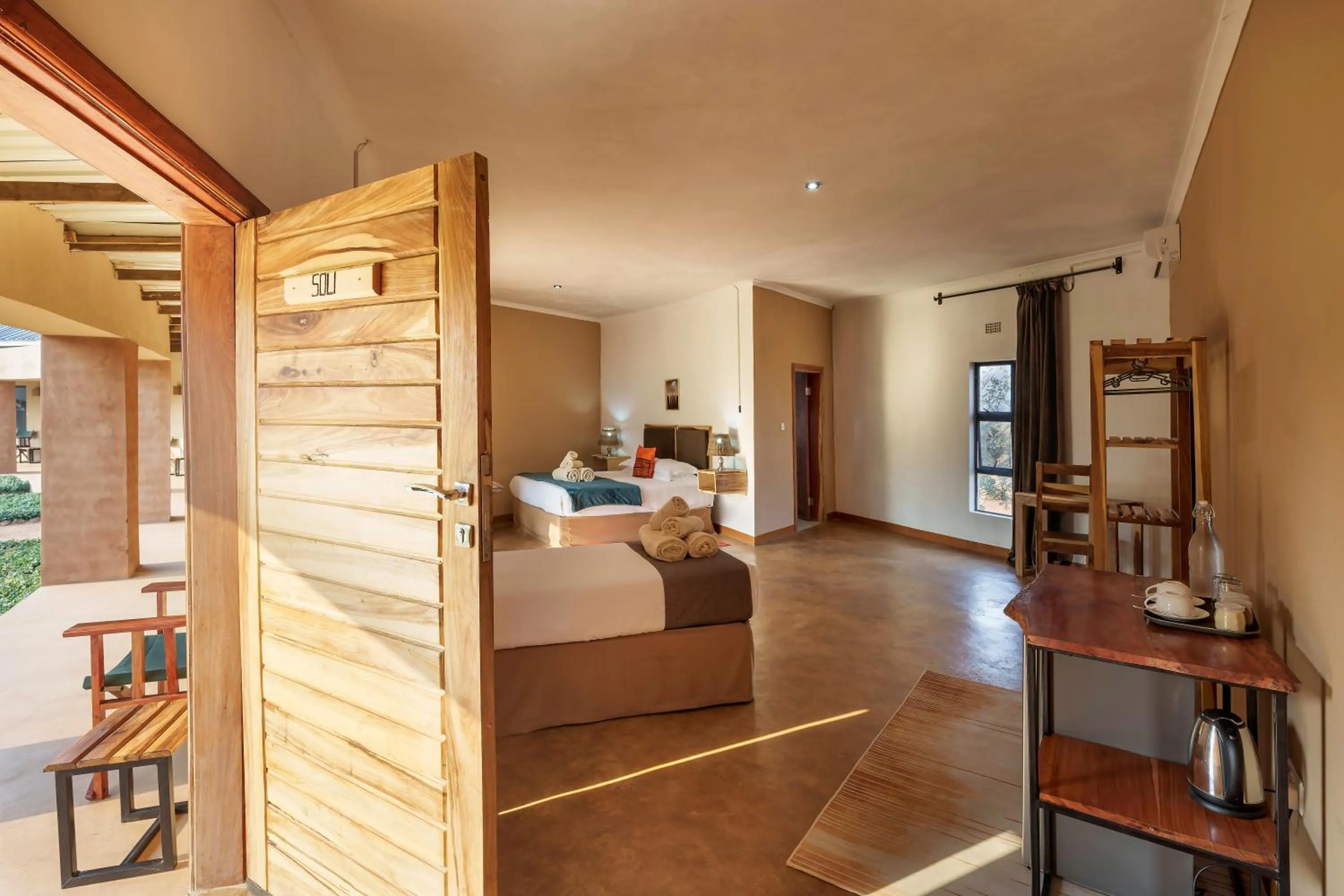 Bedroom in The Nkhosi Livingstone Lodge and Spa